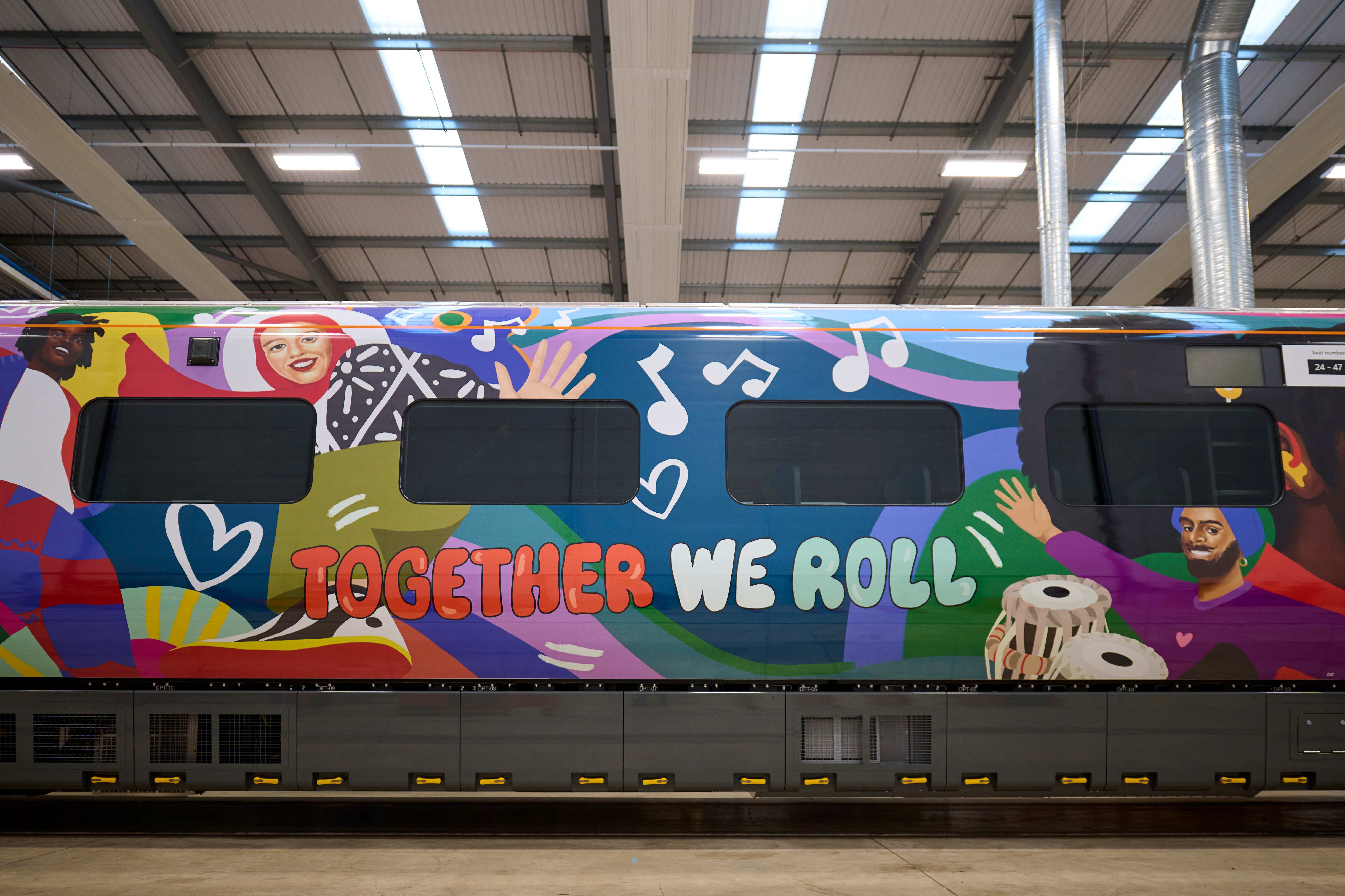 An Avanti West Coast train wrapped in the bespoke artwork