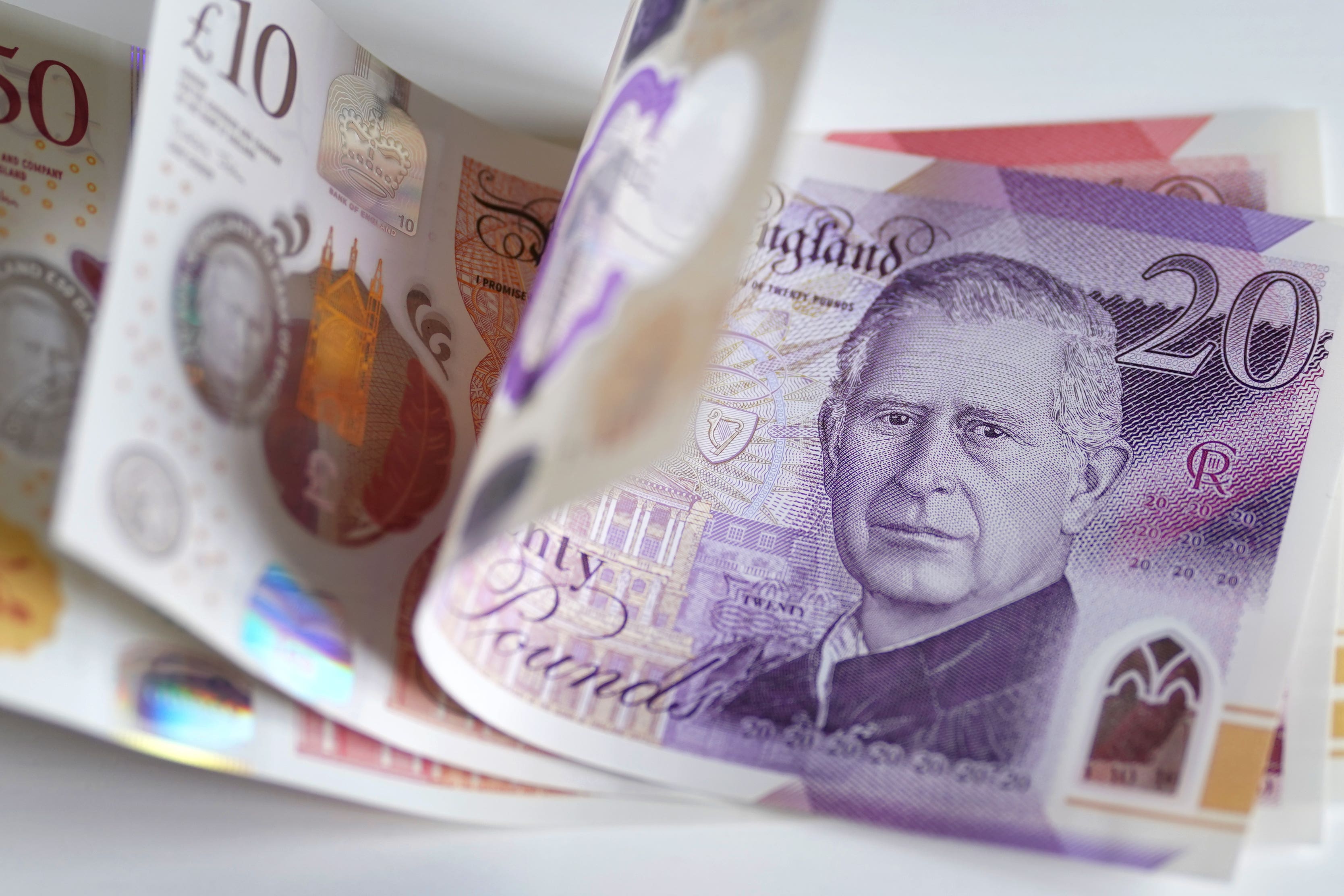 Cash usage has decreased significantly across the UK, the Treasury Committee said (Gareth Fuller/PA)