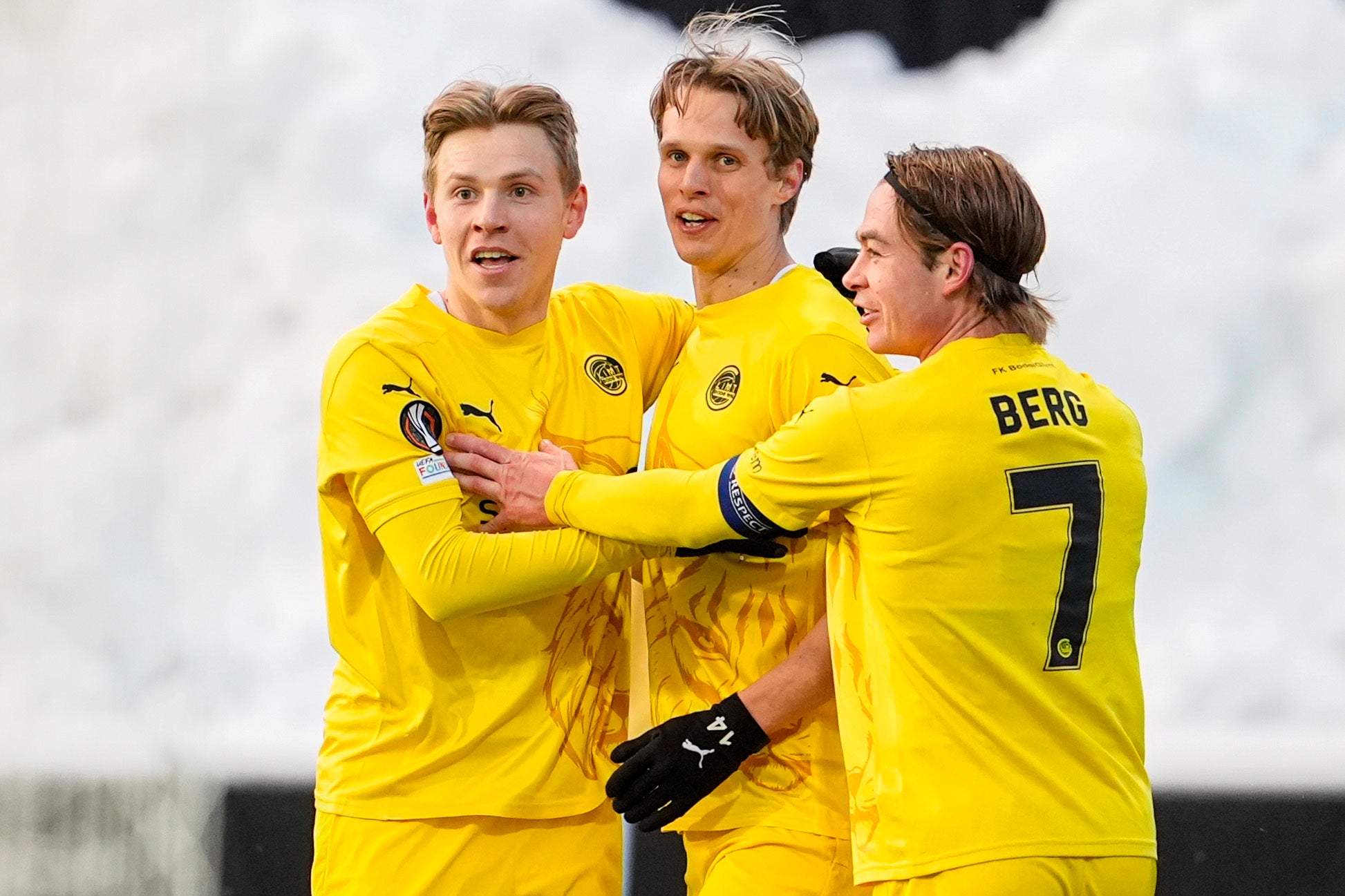 Bodø/Glimt's Ulrik Saltnes (centre) celebrates with teammates Jens Petter Hauge (left) and Patrick Berg (right) during the Europa League quarterfinal against Lazio