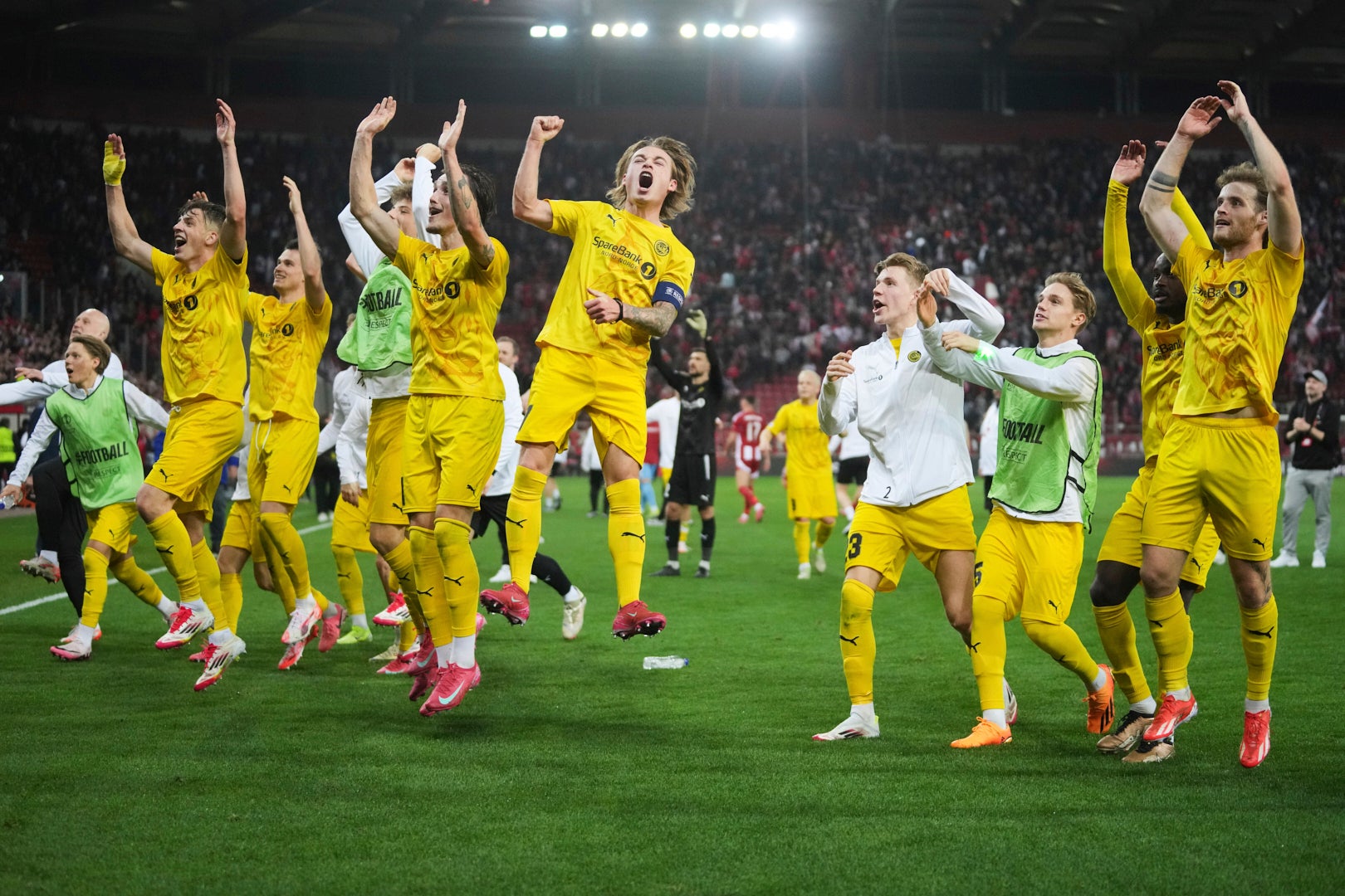 Bodø/Glimt players celebrate their qualification to the next phase after the end of the Europa League round of 16 second leg soccer match between Olympiacos FC and FK Bodo/Glimt at the Georgios Karaiskakis stadium