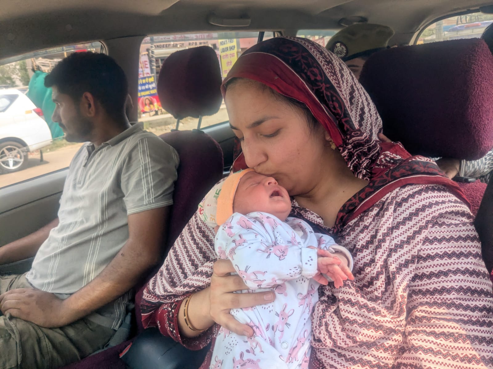 Sara Khan, a Pakistani woman married to an Indian citizen, prepares to leave her newborn behind