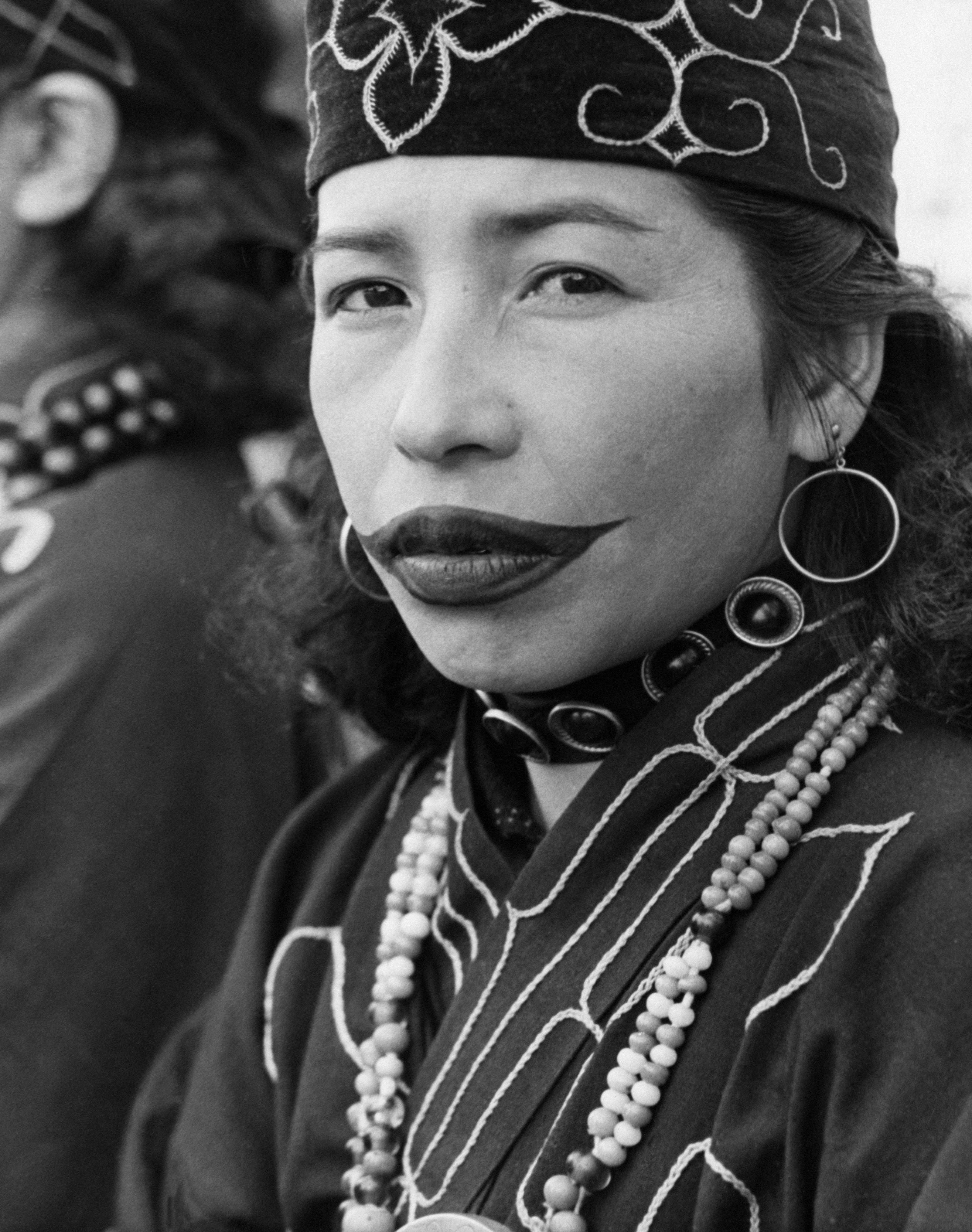 An Ainu woman from northern Japan with tattooed lips, c. 1960