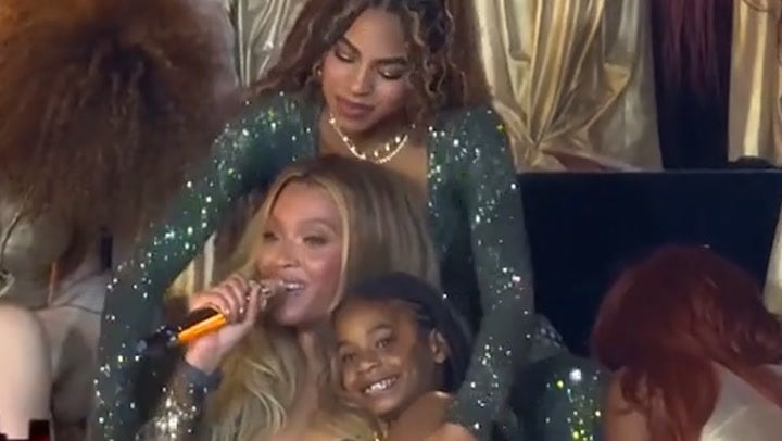 Blue Ivy, Beyonce and Rumi on stage during the tour