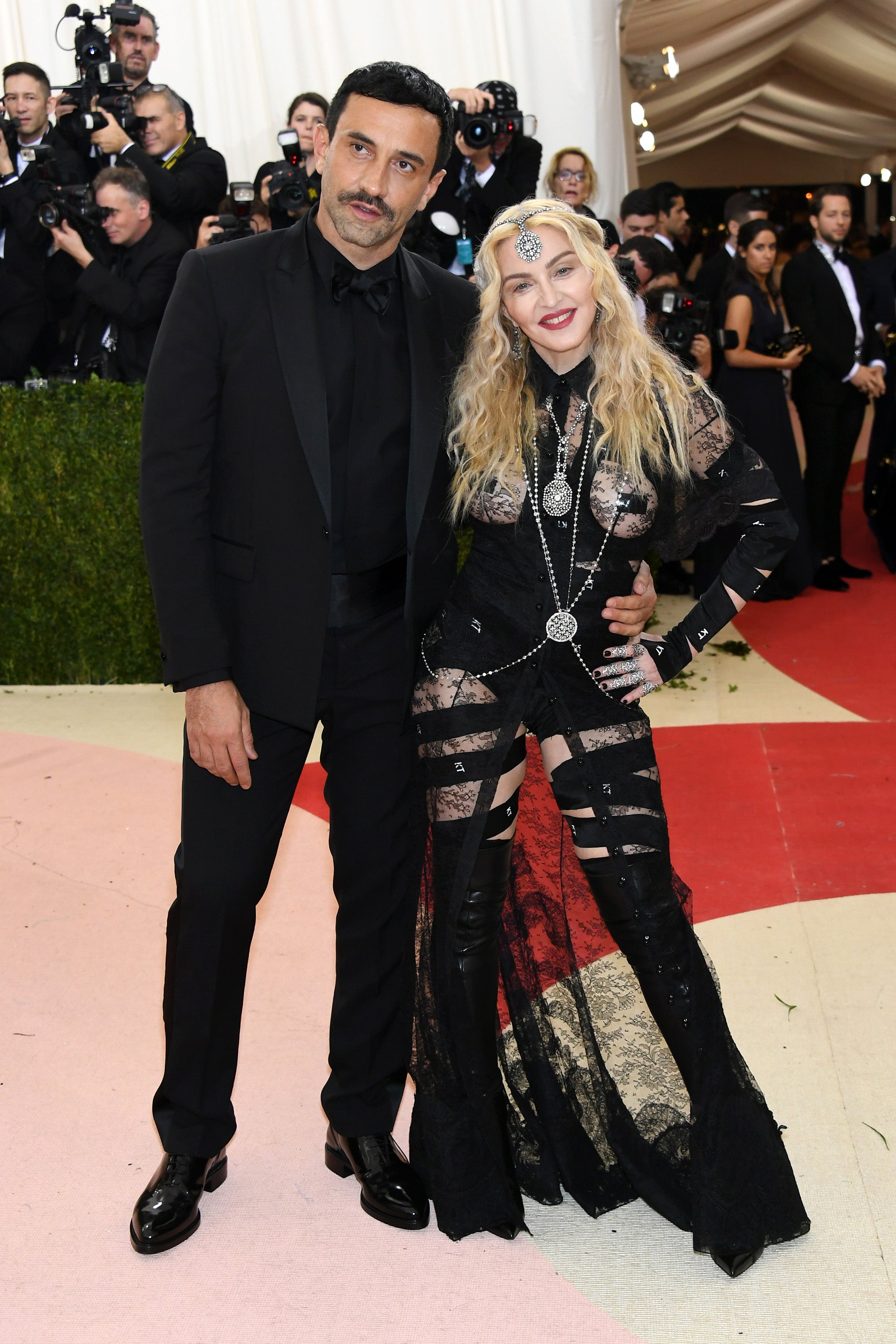 Tisci and Madonna, seen here in 2016 at the Metropolitan Museum of Art's Costume Institute Gala. A New York City man says the designer assaulted him after drugging his drink.