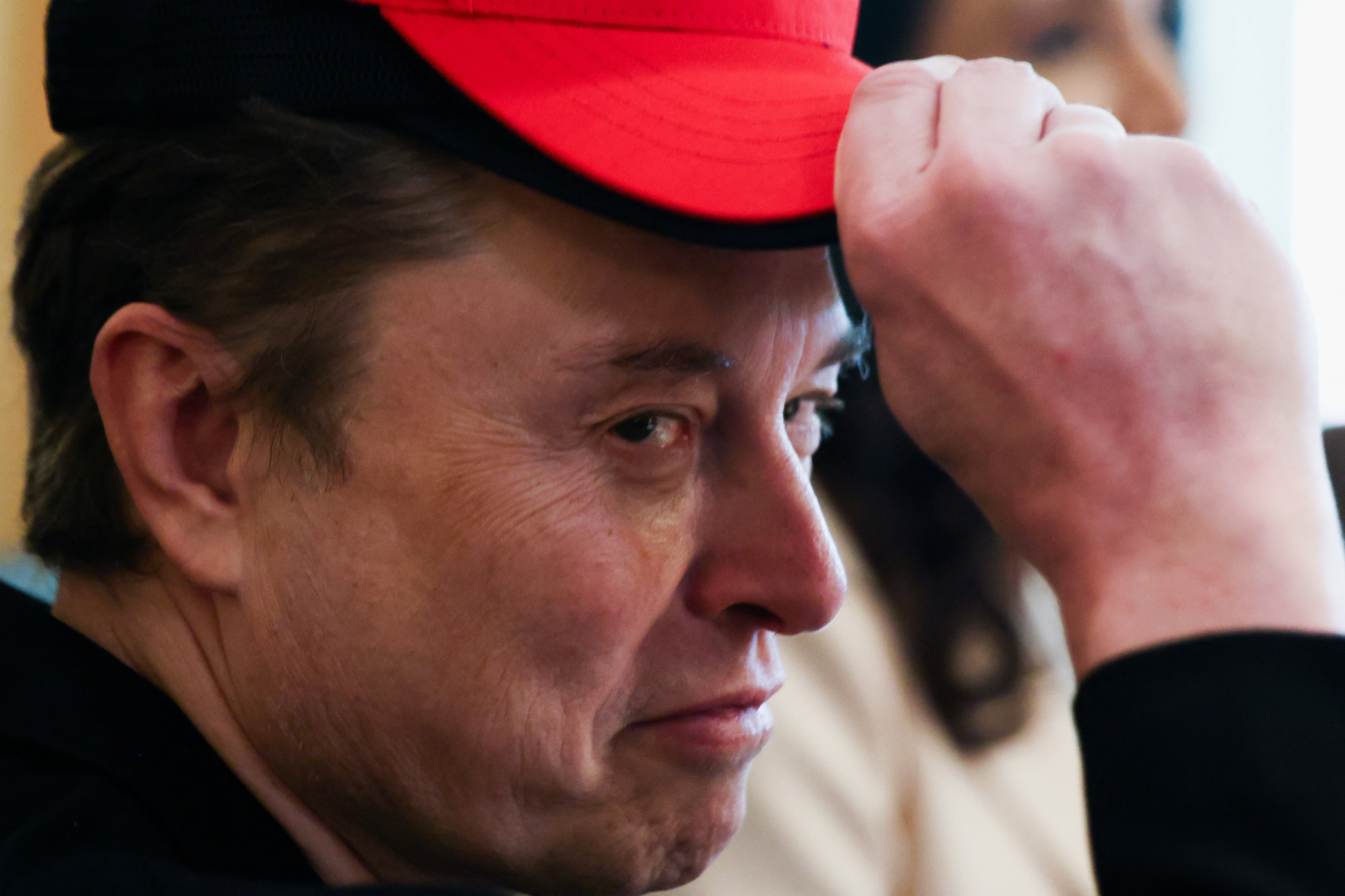 Elon Musk has scaled down his initial boasts of $2 trillion of savings