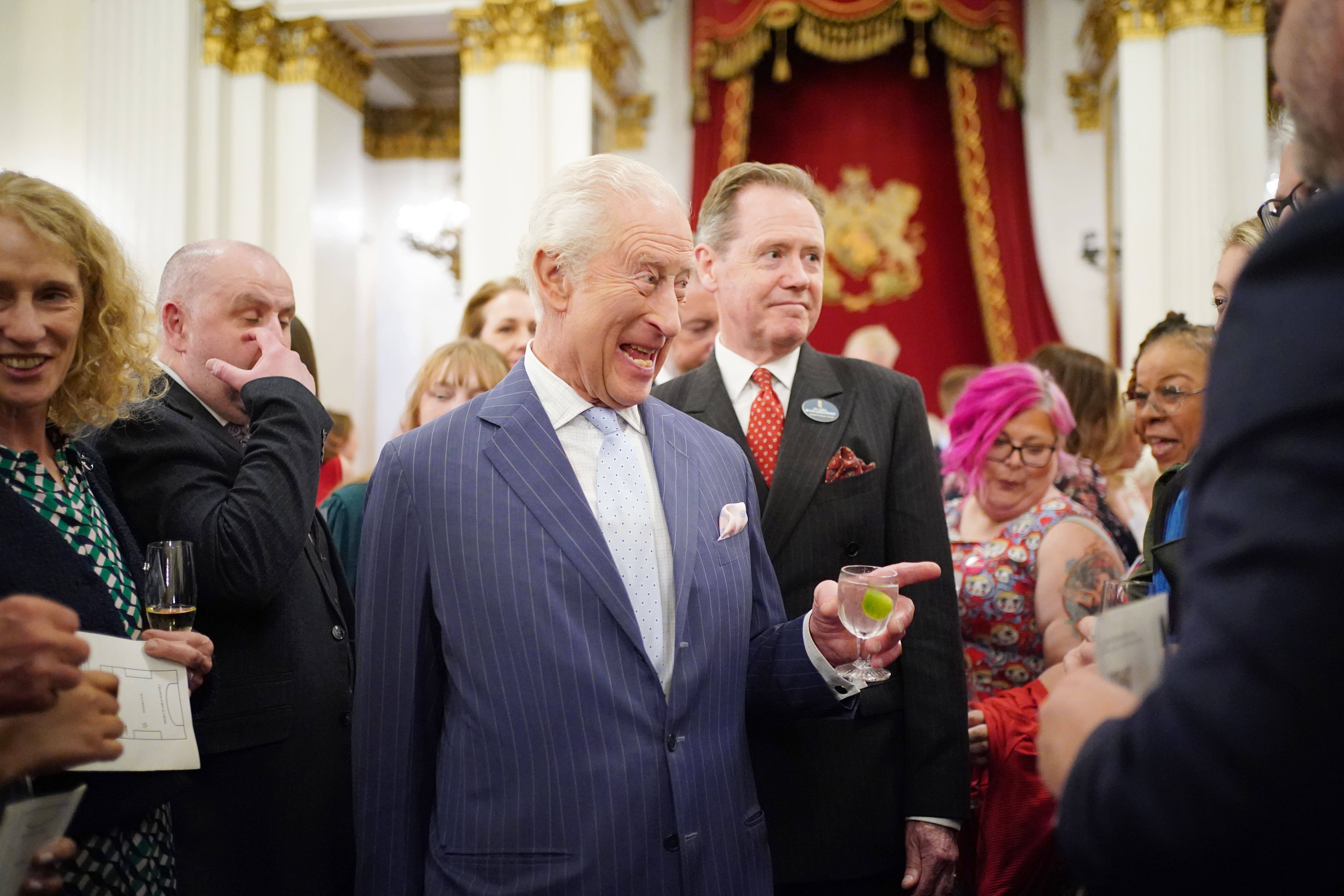 Charles during a reception in Buckingham Palace in celebration of community-based initiatives supporting those living with cancer (Yui Mok/PA)