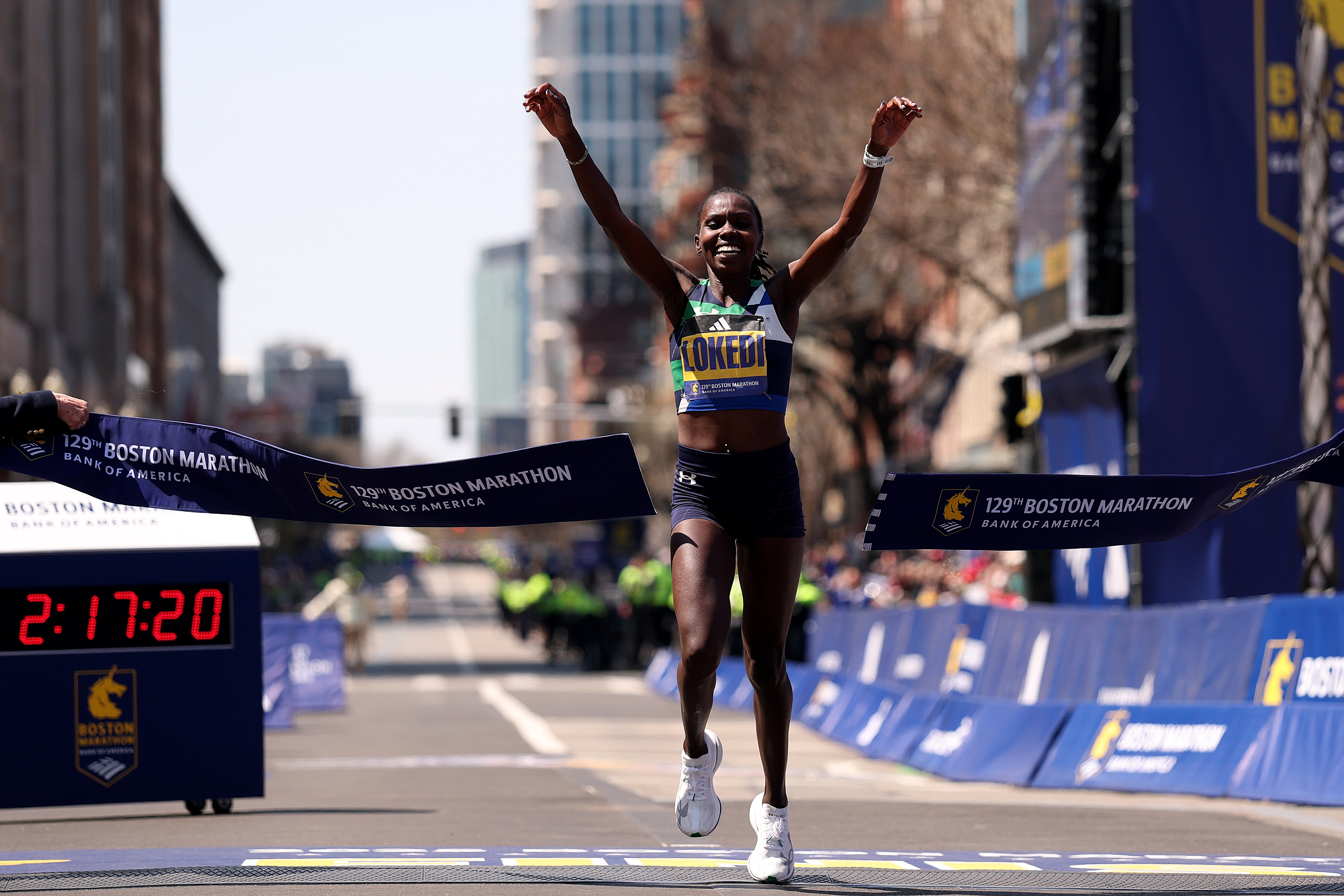 Sharon Lokedi of Kenya crosses the finish line to win the 129th Boston Marathon Women's division on 21 April, 2025
