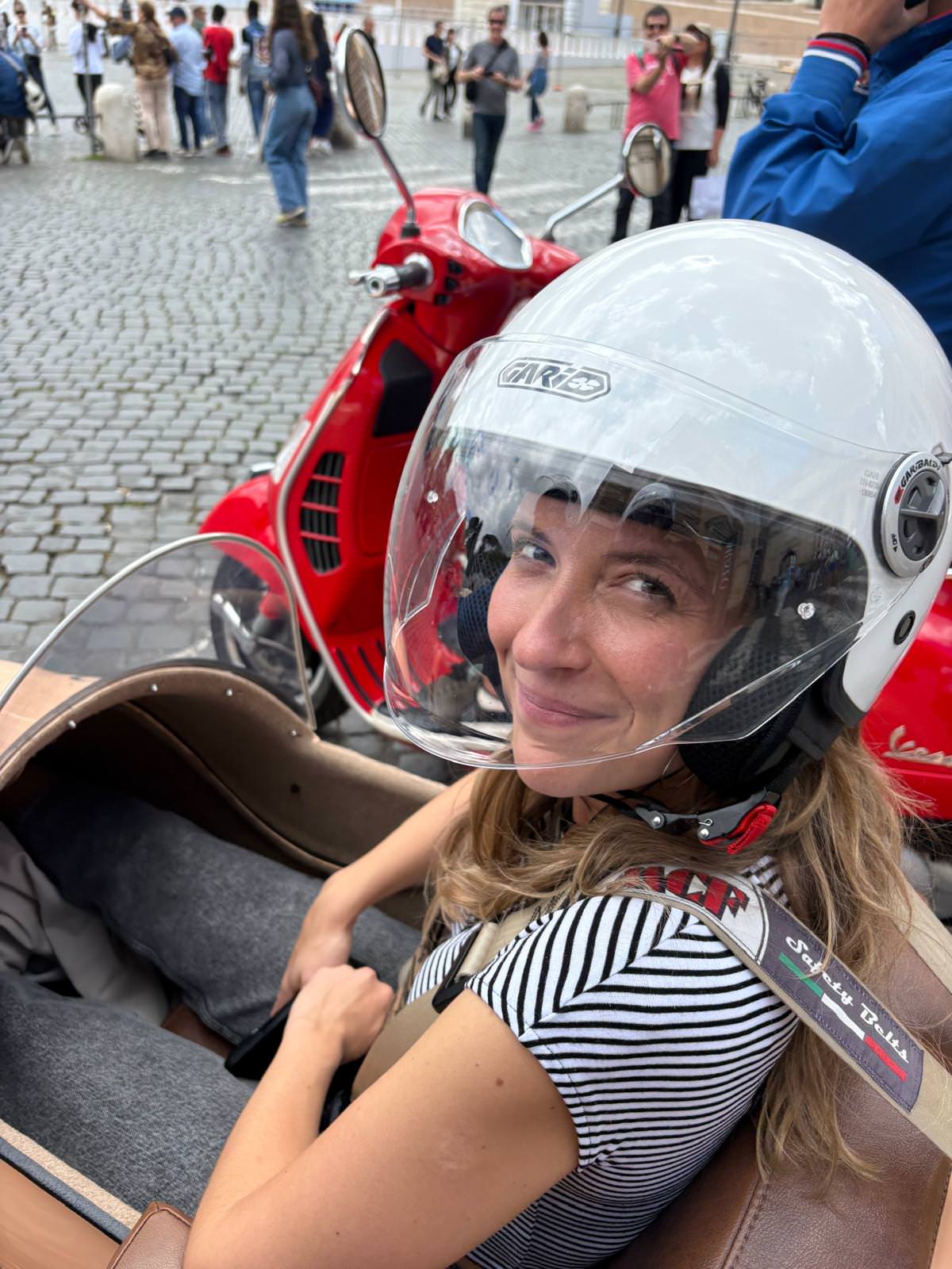 Writer Robyn Wilson on a Vespa sidecar tour in Rome