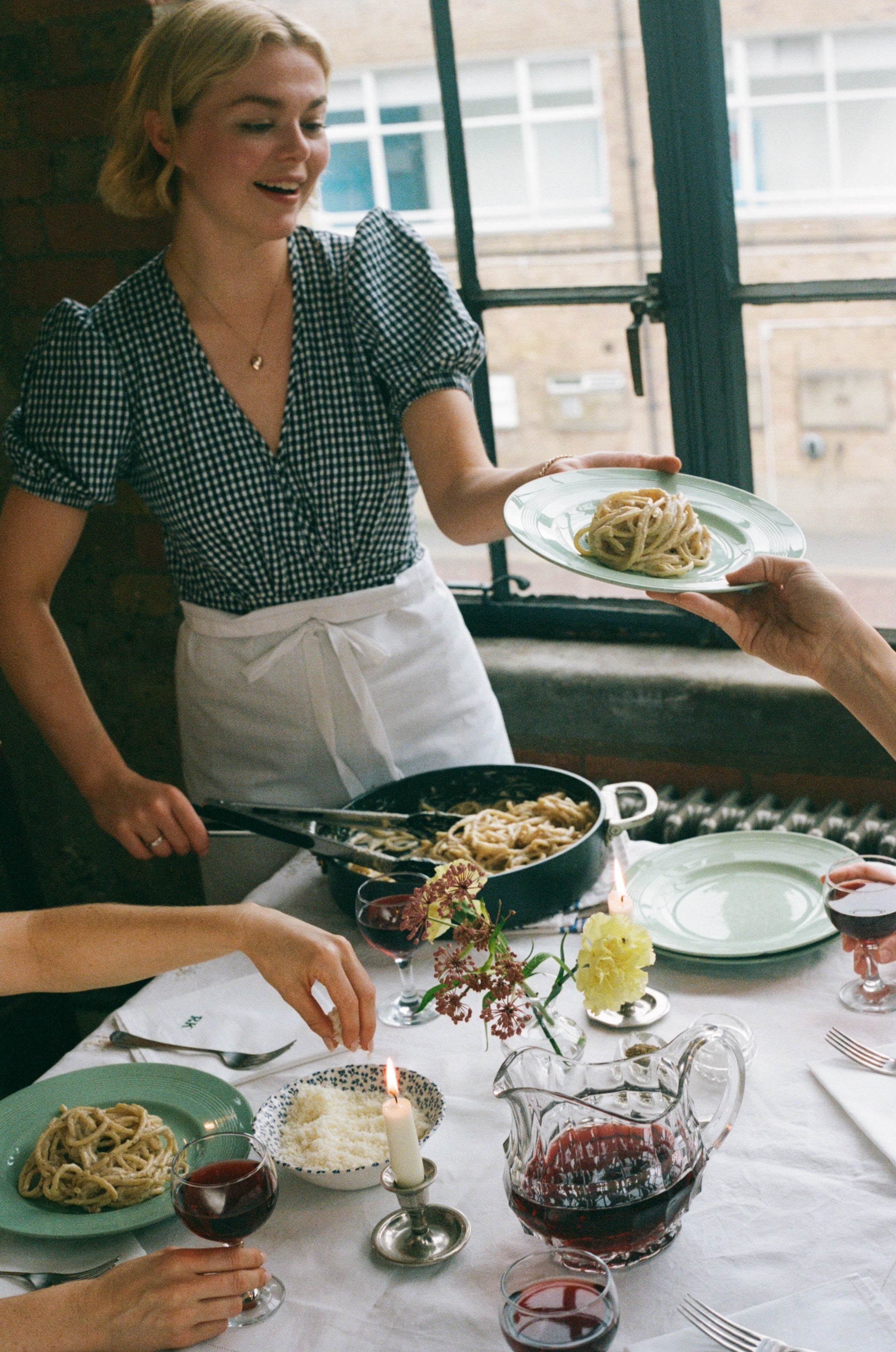  Kellett dishes up a crowd-pleasing classic, one of the many weeknight meals made on rotation in the shared kitchen