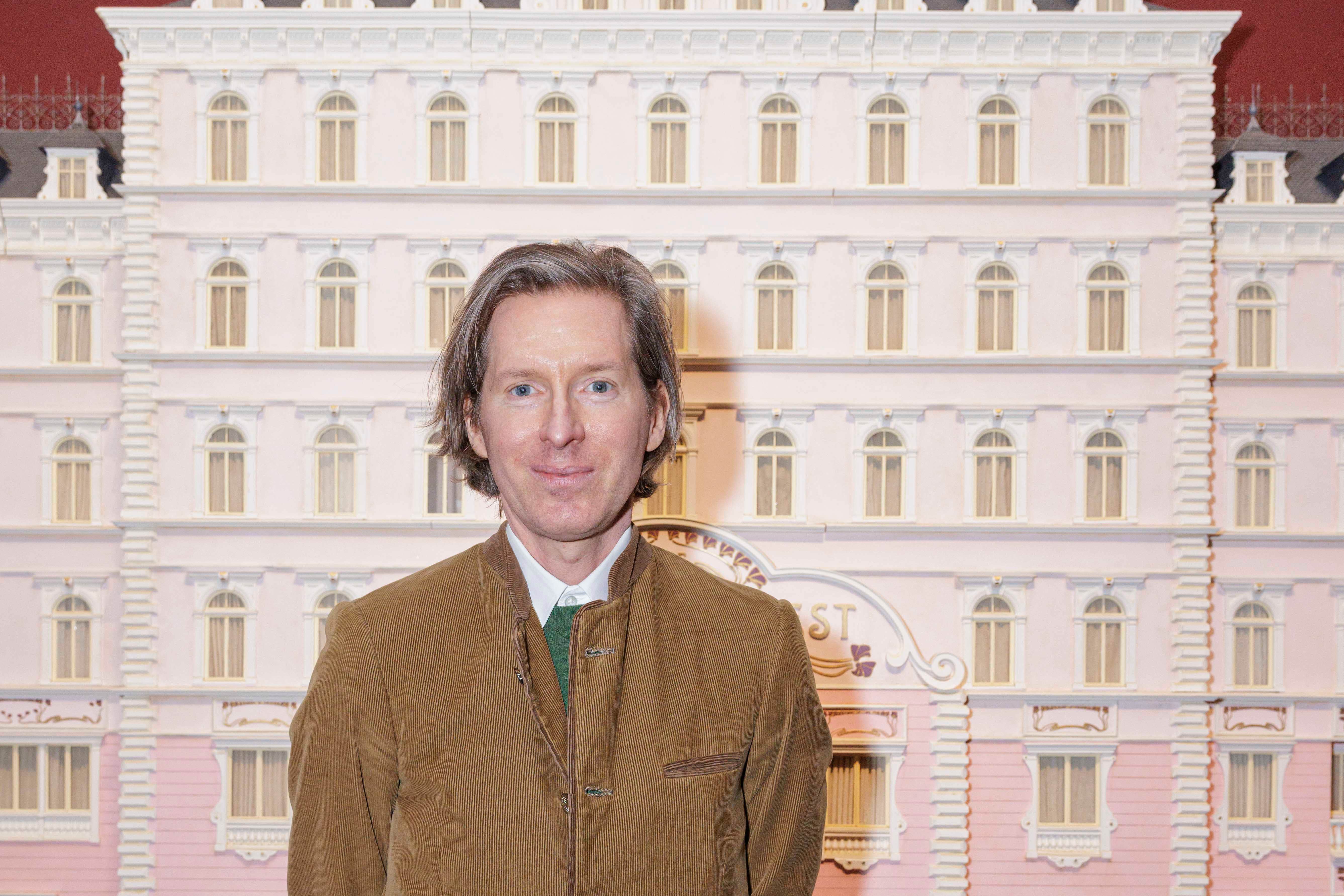 Wes Anderson with the Grand Budapest Hotel model (Thierry Stefanopoulos – La Cinematheque francaise/PA)