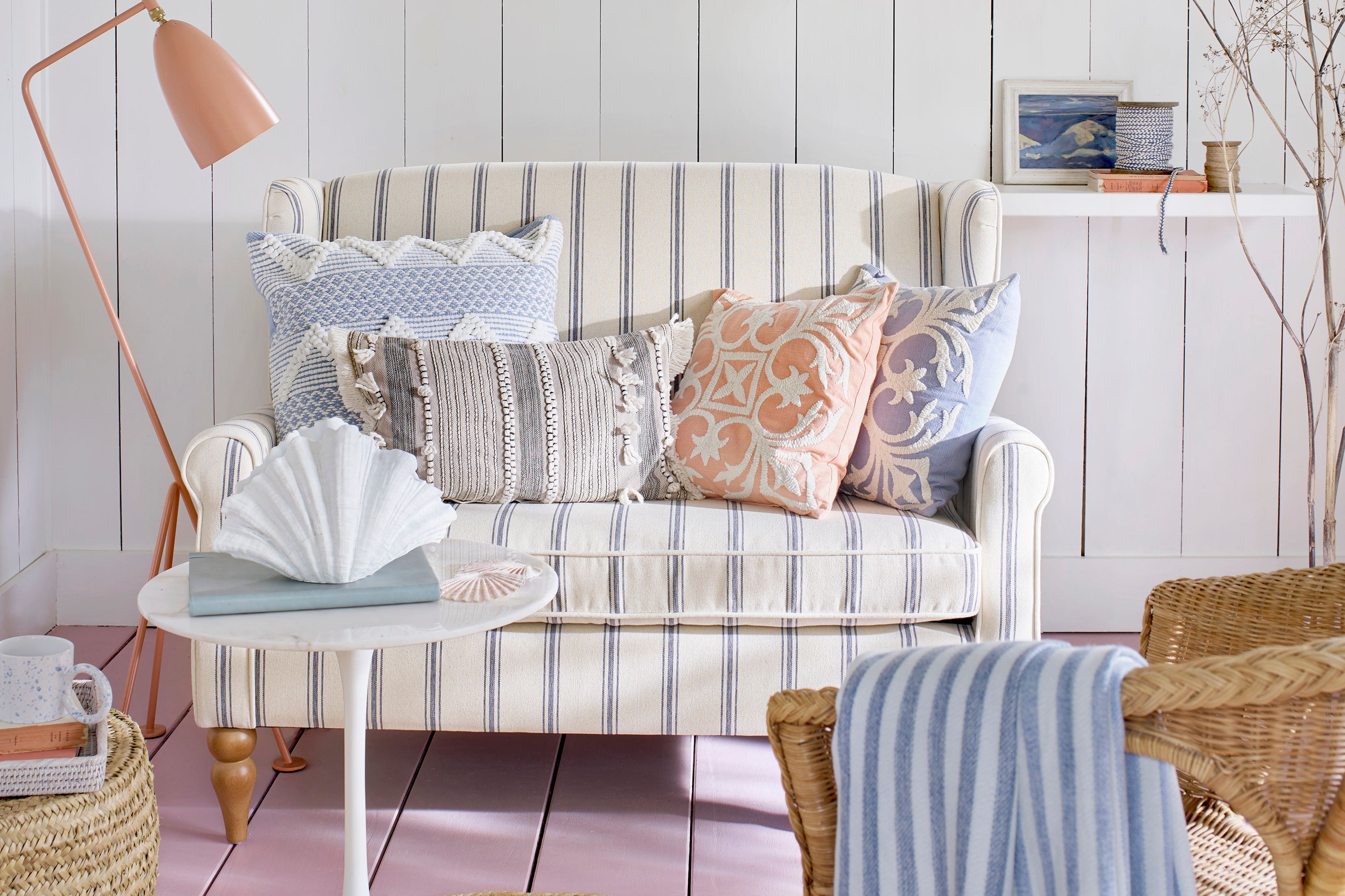 Blue hues and natural fabrics signal sunnier climes (Matalan/PA)