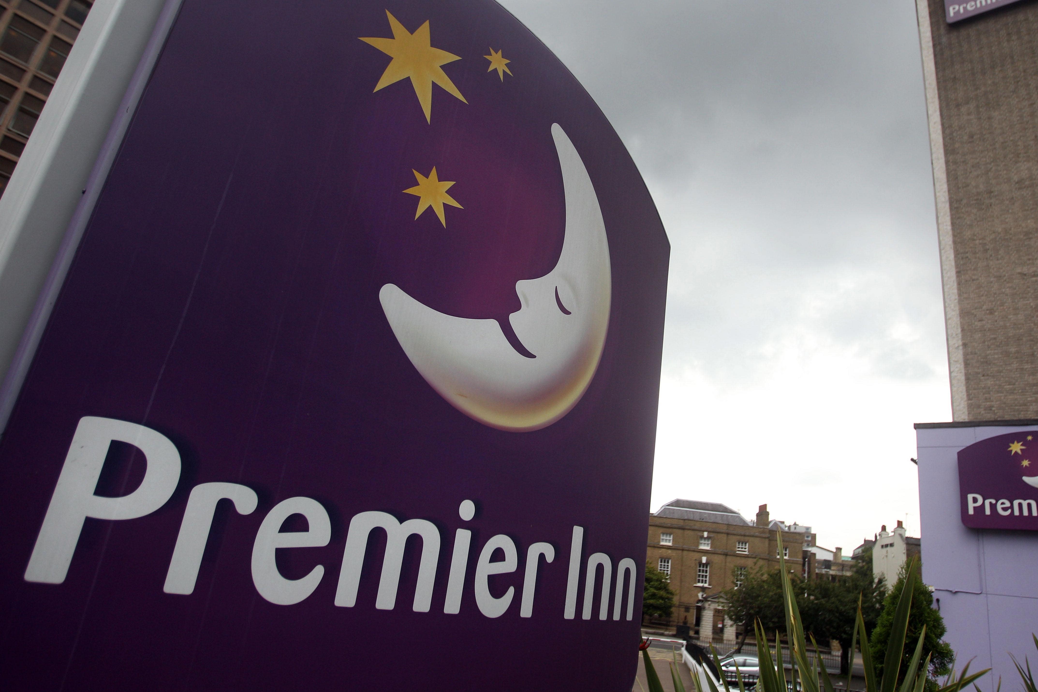 Premier Inn owner Whitbread has reported lower profits (Lewis Whyld/PA)