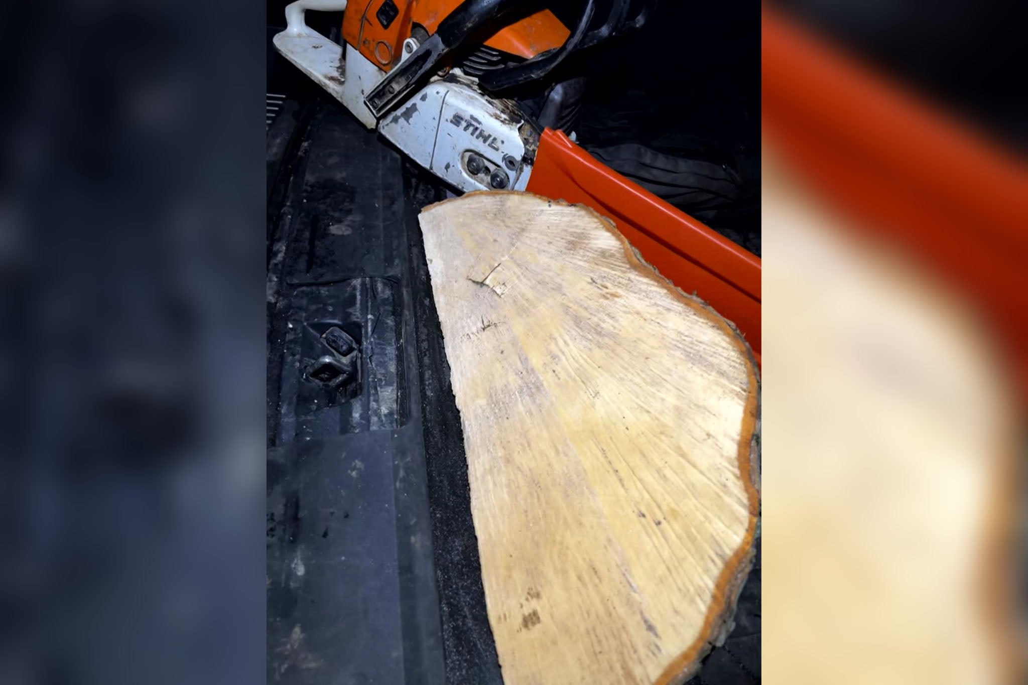 A still from footage found on the phone of Daniel Graham of a chainsaw and wedge of a trunk allegedly filmed in the back of Graham’s car boot