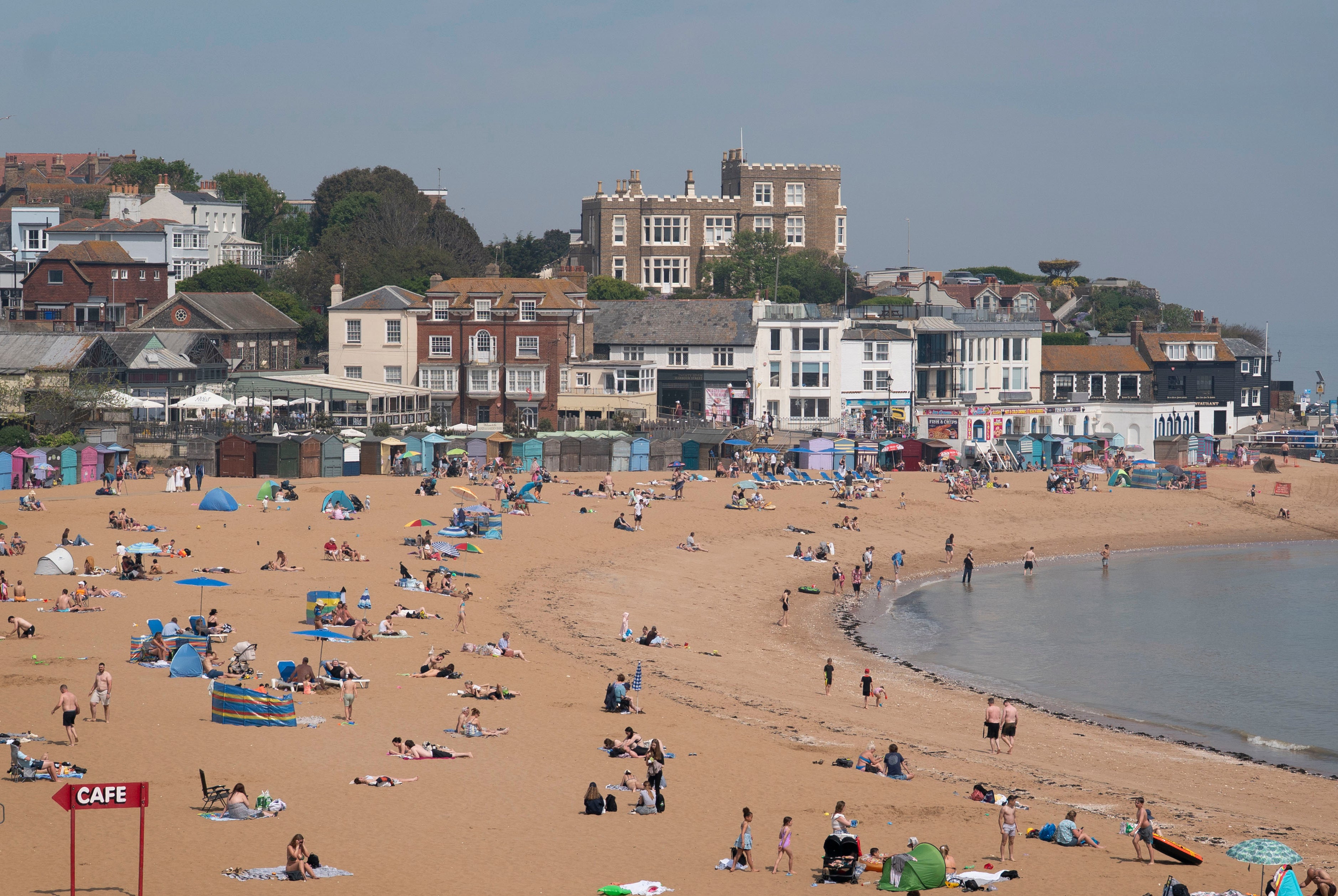 People enjoy the beach in Broadstairs, Kent