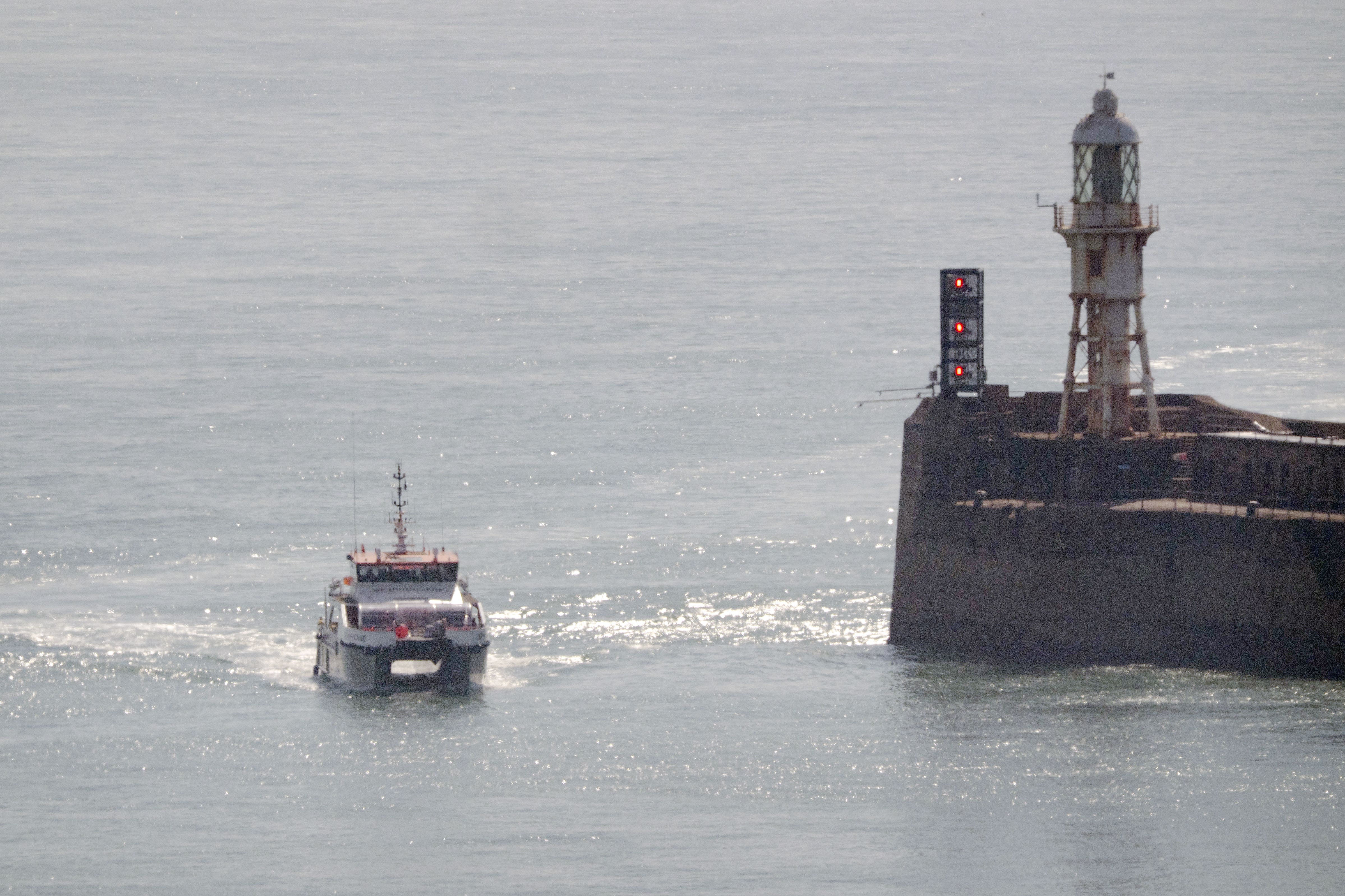 A group of people thought to be migrants are brought in to Dover on board a Border Force vessel on Thursday (Gareth Fuller/PA)