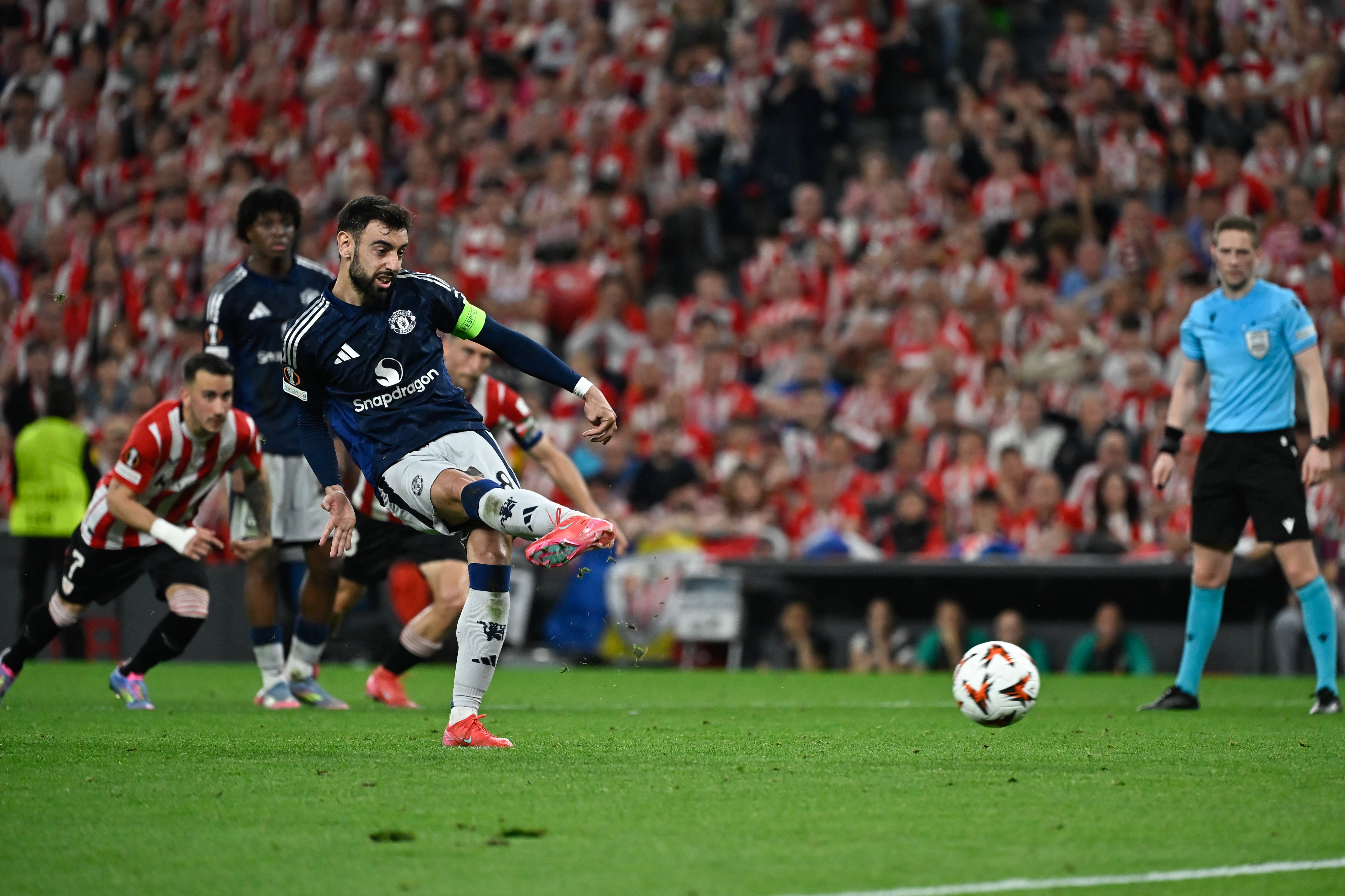 Fernandes slots home United's second goal from the spot