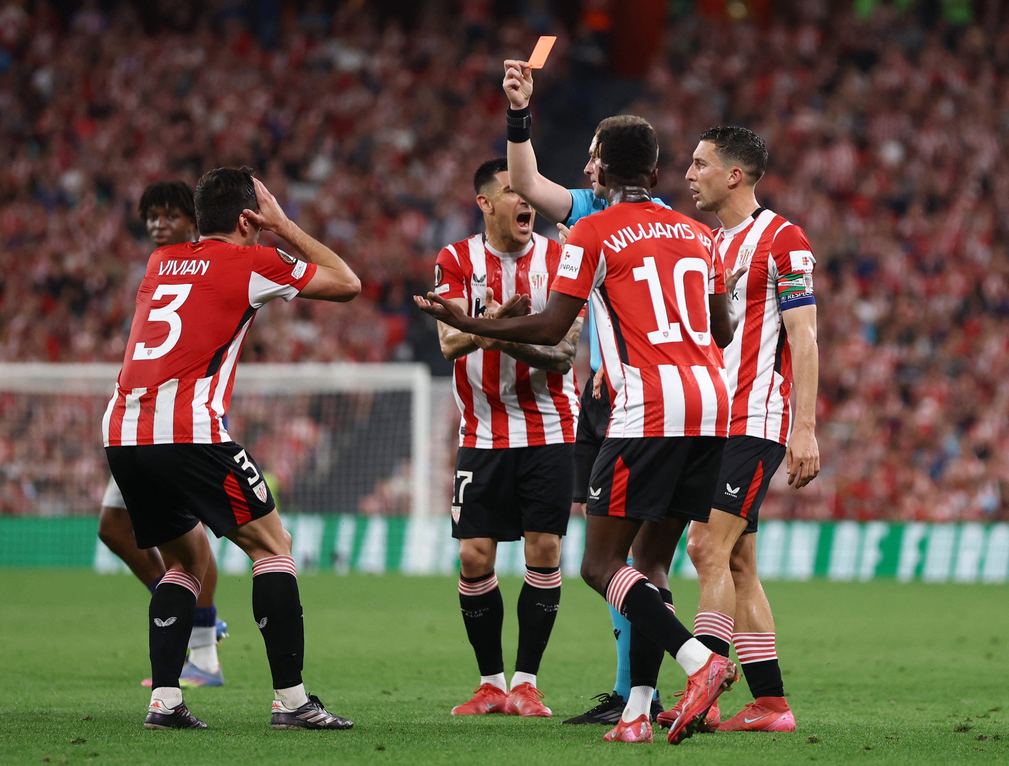 Vivian reacts after being shown the red card