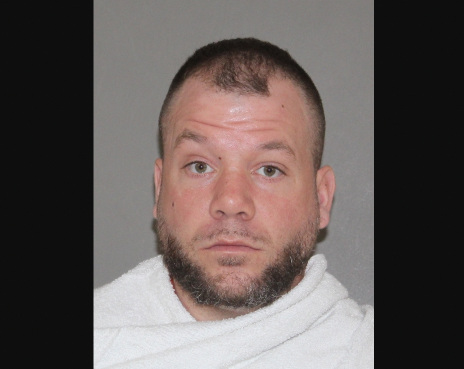 John Howard Ore, 36, of Denton, faces four arson charges, following an investigation into the deaths of 103-year-old Dante Bassi and 83-year-old Marilyn Bradley-Bassi in December. Detectives allege he also set fires at a restaurant and at a daycare