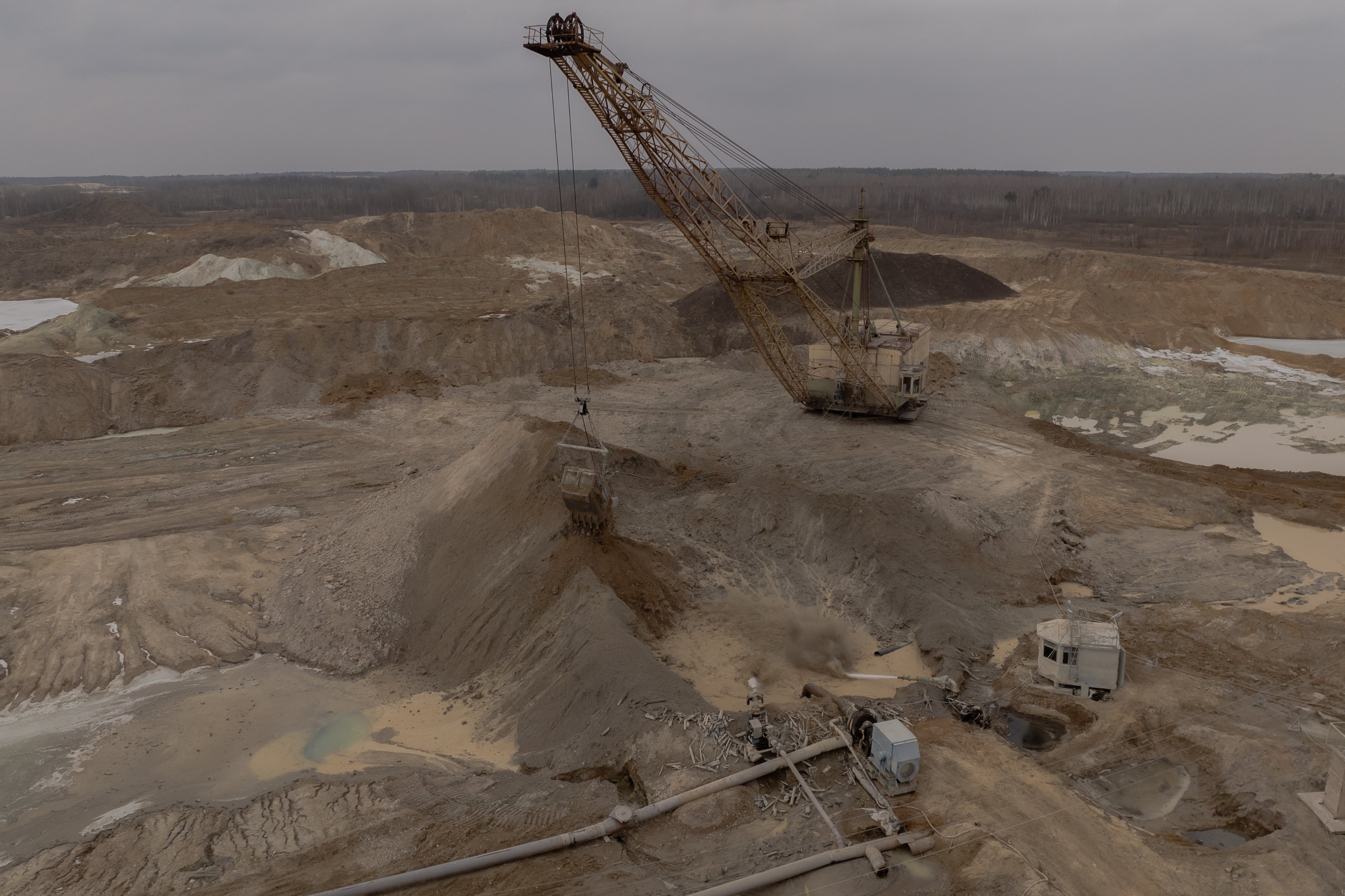 File An aerial view shows a dragline excavator operating in an open-pit titanium mine in the Zhytomyr region, on February 28, 2025, amid the Russian invasion of Ukraine