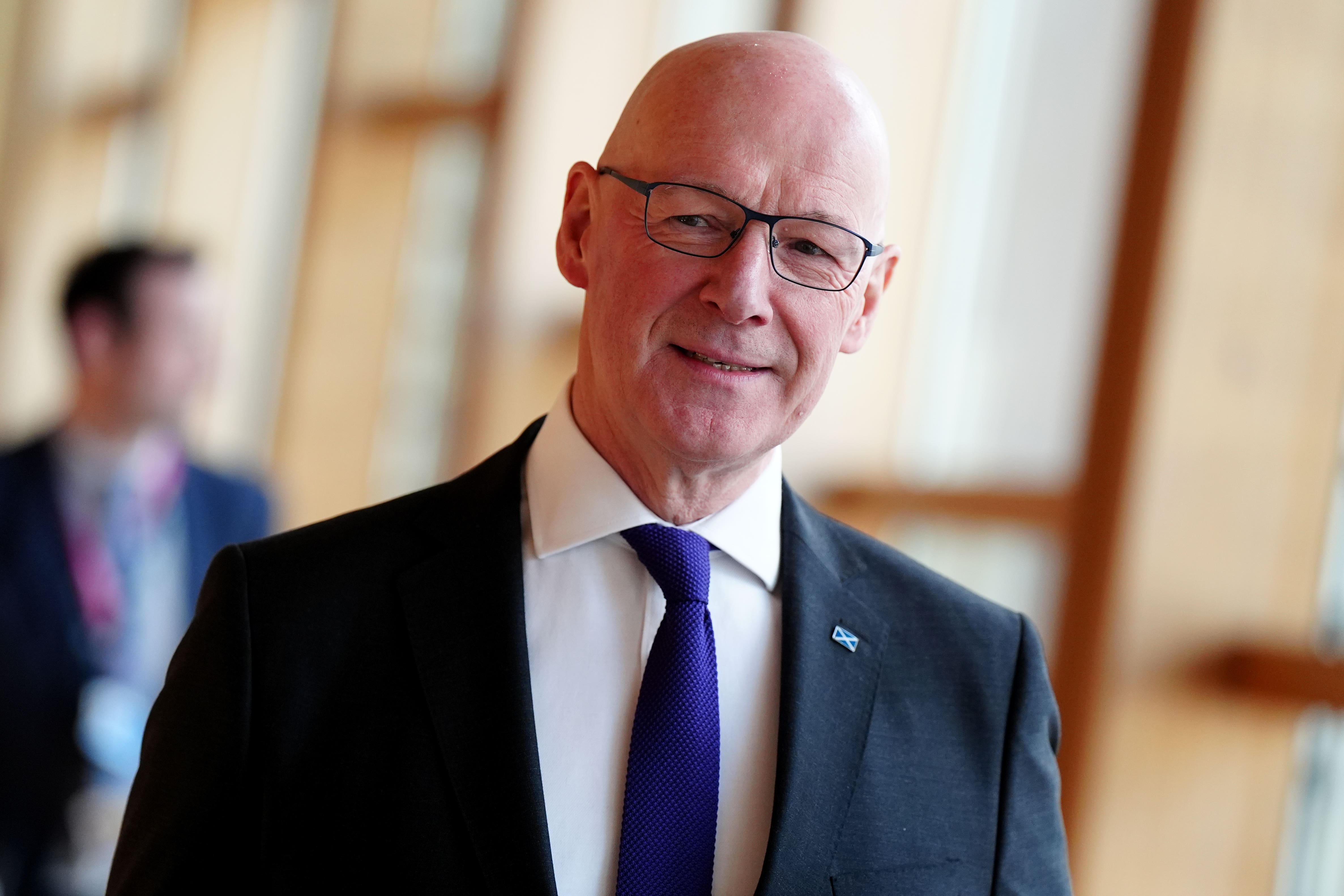 Scottish First Minister John Swinney wants parties to ‘recommit’ to efforts to tackle climate change (Jane Barlow/PA)