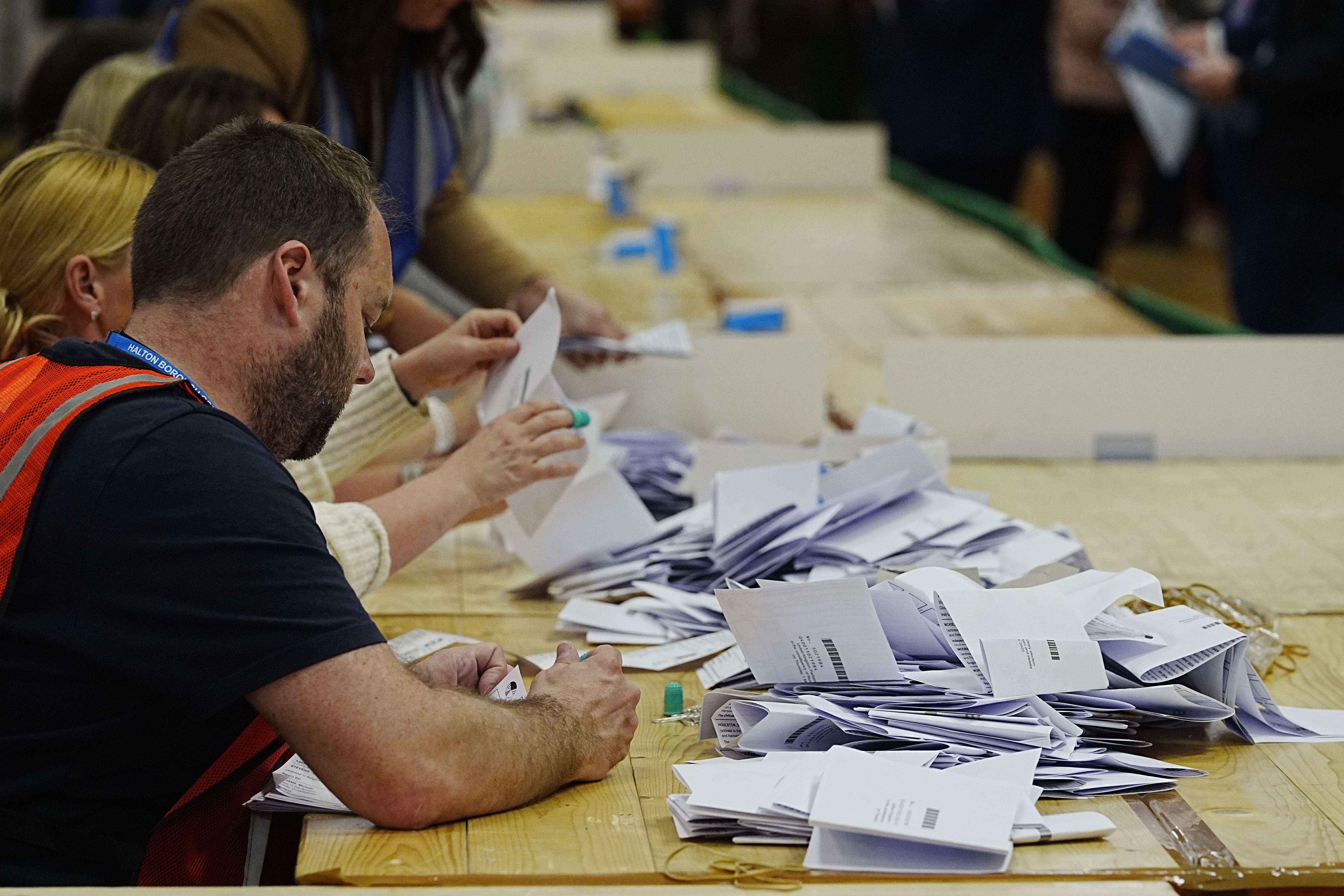 Votes are counted at DCBL Halton Stadium, Widnes, Cheshire, for the Runcorn and Helsby by-election (PA)