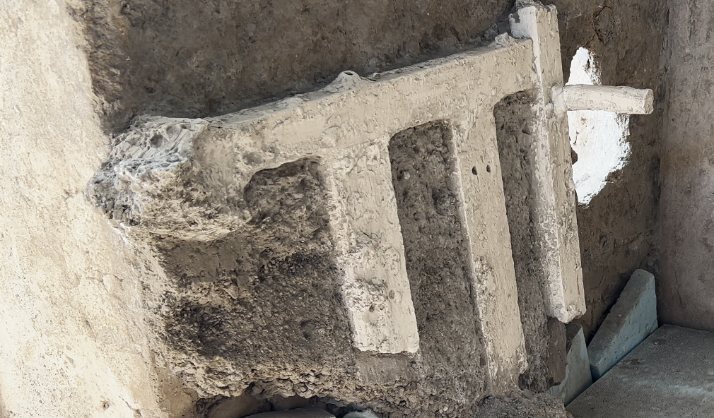 Archaeologists identified the shape of the bed’s wooden frame in the solidified ash