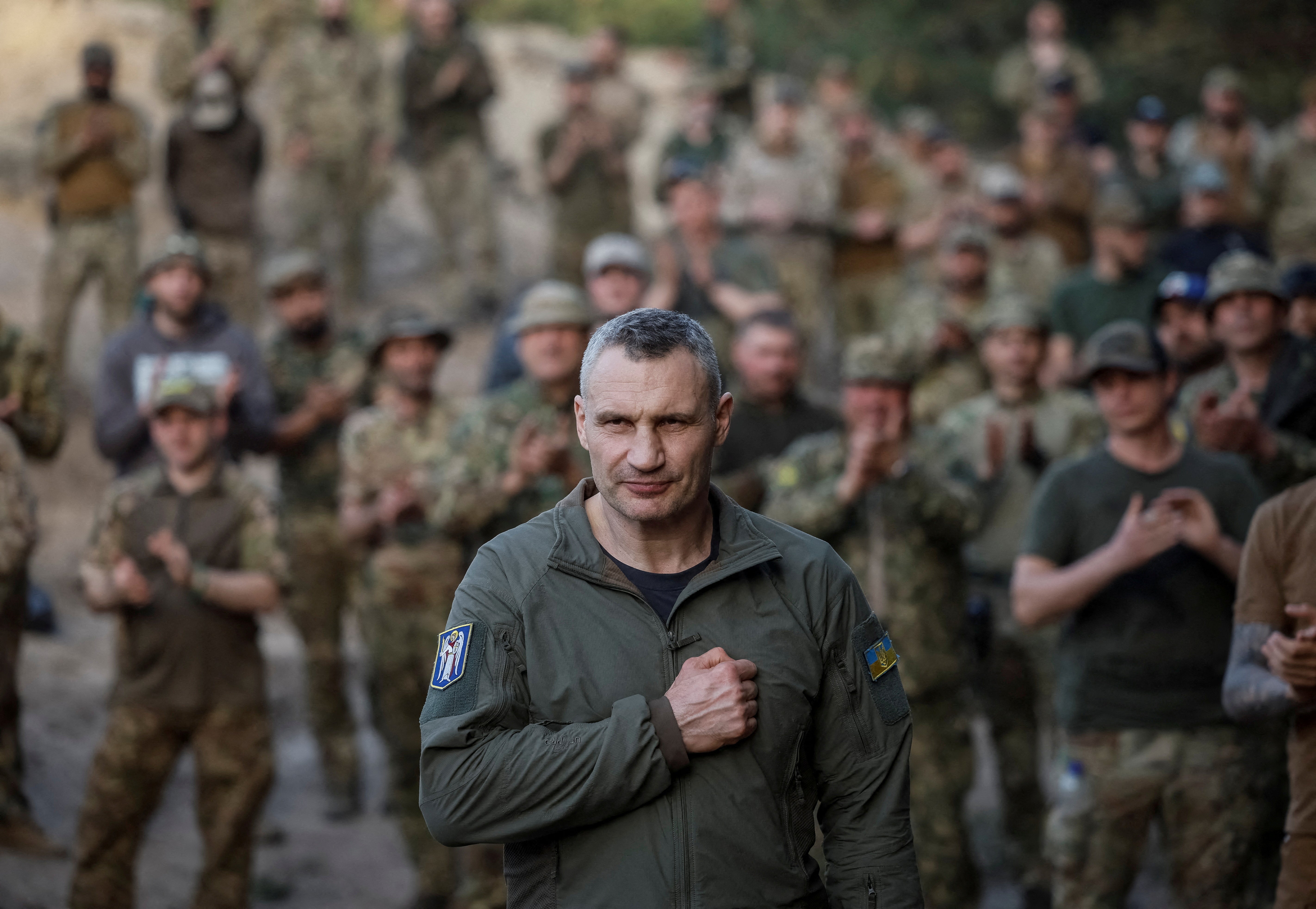 FILE PHOTO: Kyiv Mayor Vitali Klitschko greets servicemen of the Svoboda (Freedom) battalion from the elite Storm Brigade "Rubizh" of the National Guard of Ukraine before an award ceremony for fighters, who have recently returned from the frontline in the Bakhmut area of Donetsk region, amid Russia's attack on Ukraine, in Kyiv region, Ukraine April 11, 2024. REUTERS/Gleb Garanich/File Photo