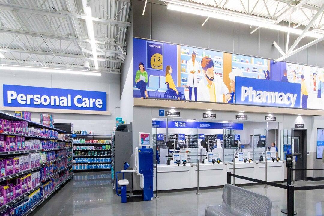 An example of a remodeled Walmart pharmacy and personal care aisle inside a newly-opened Supercenter in Cypress, Texas