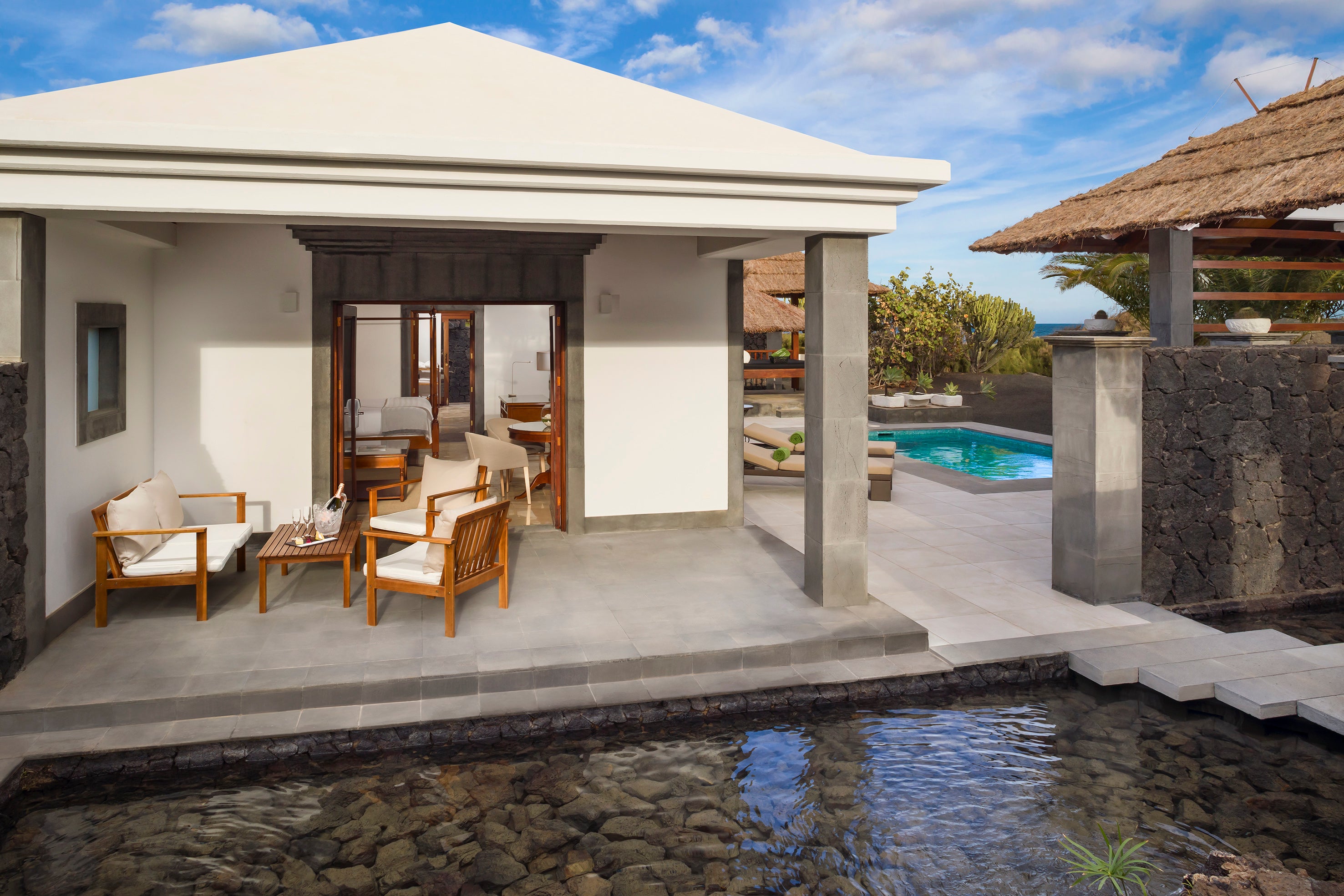 This adults-only hotel is surrounded by two white-sand beaches