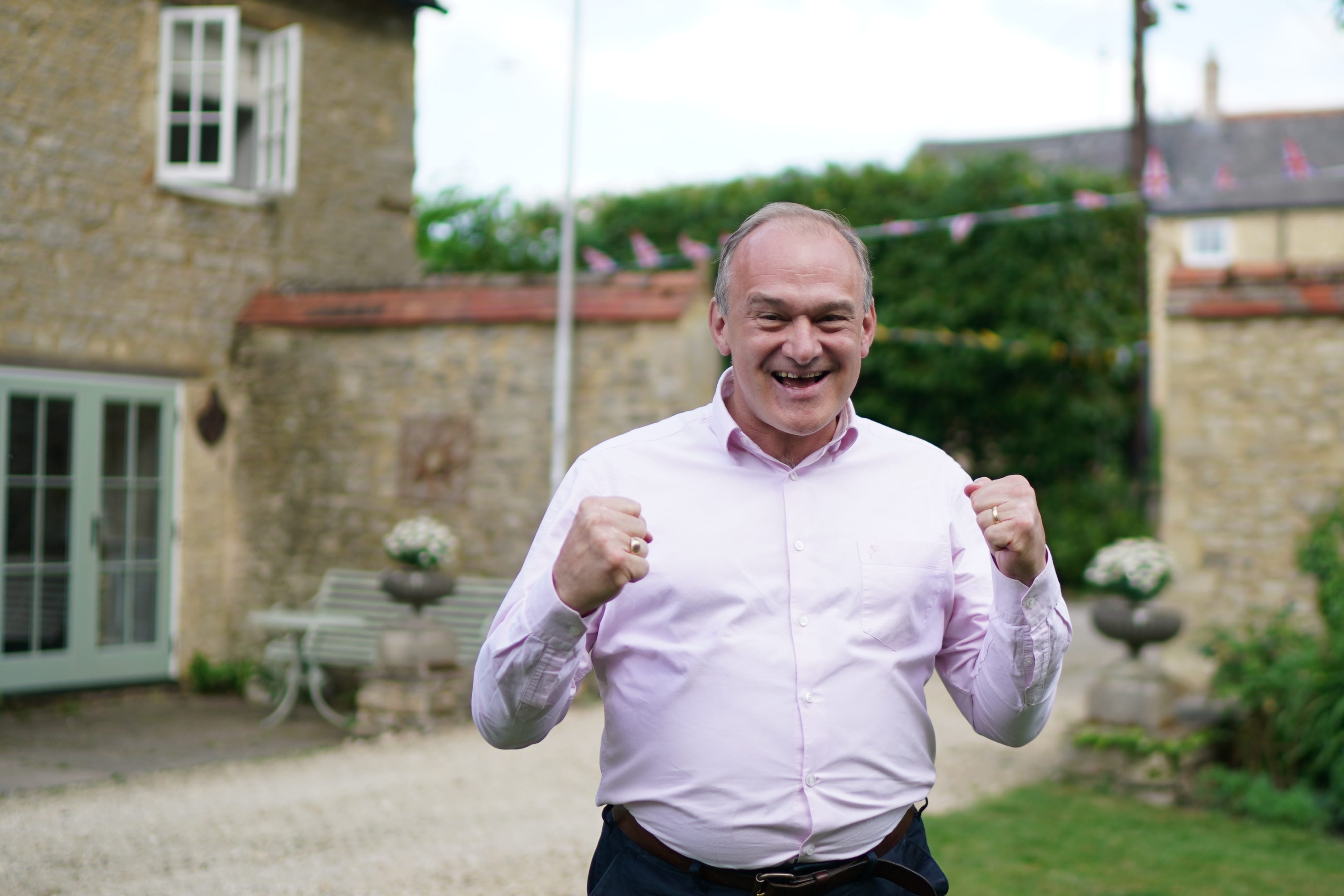 Sir Ed Davey celebrated as his party gained more than 100 seats at the local elections (Gareth Fuller/PA)