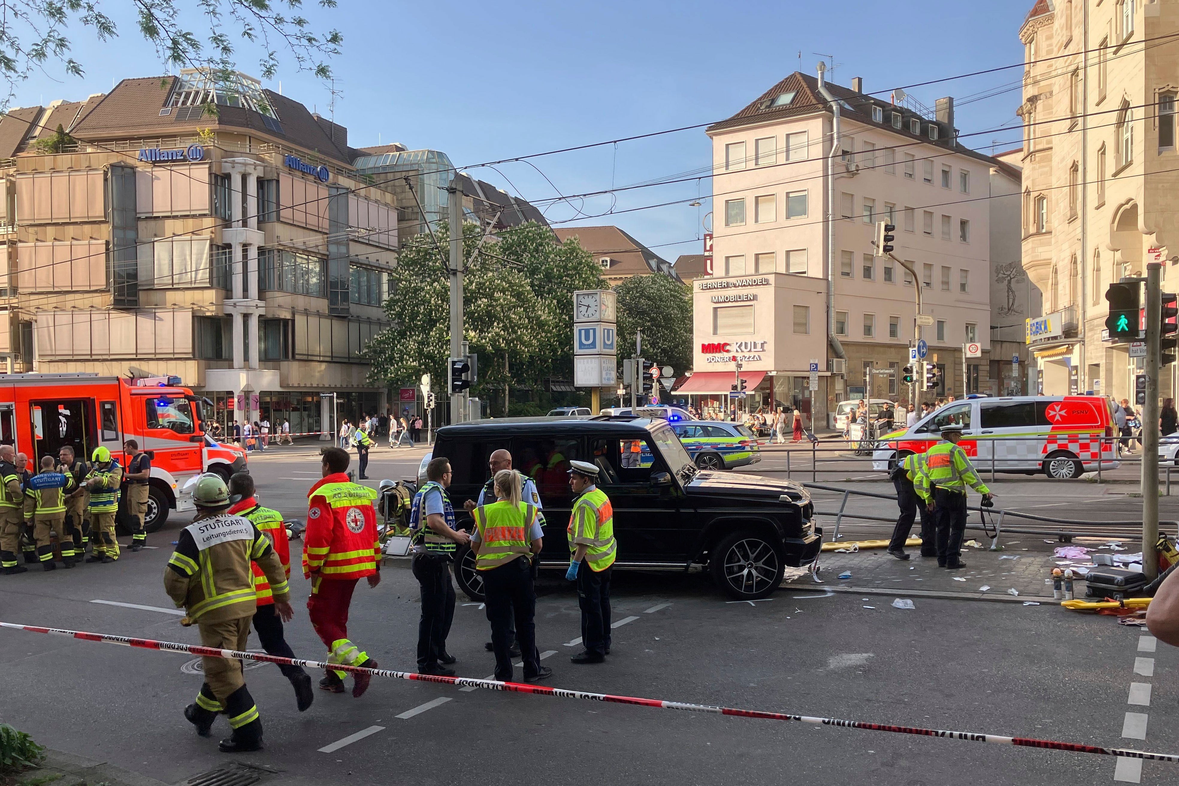 Emergency services work at the scene where a vehicle collided into a group of people in Stuttgart, Germany, on Friday, May 2, 2025.