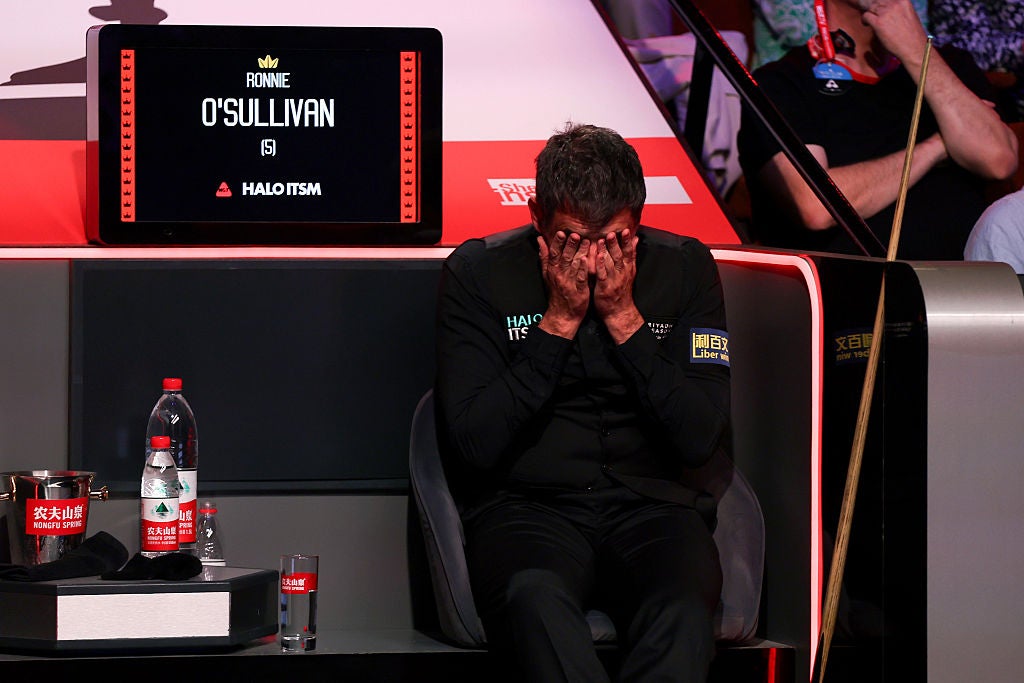 Ronnie O'Sullivan crashed out of the Snooker World Championship with a session to spare