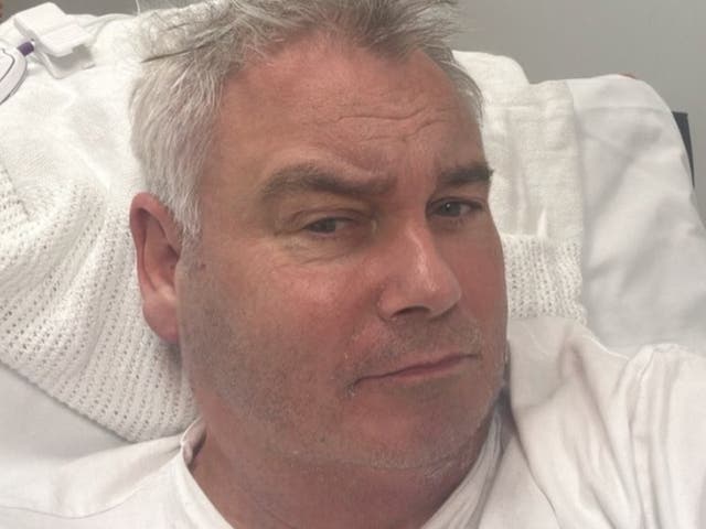 <p>Eamonn Holmes shared a photo from his hospital bed after falling at home</p>
