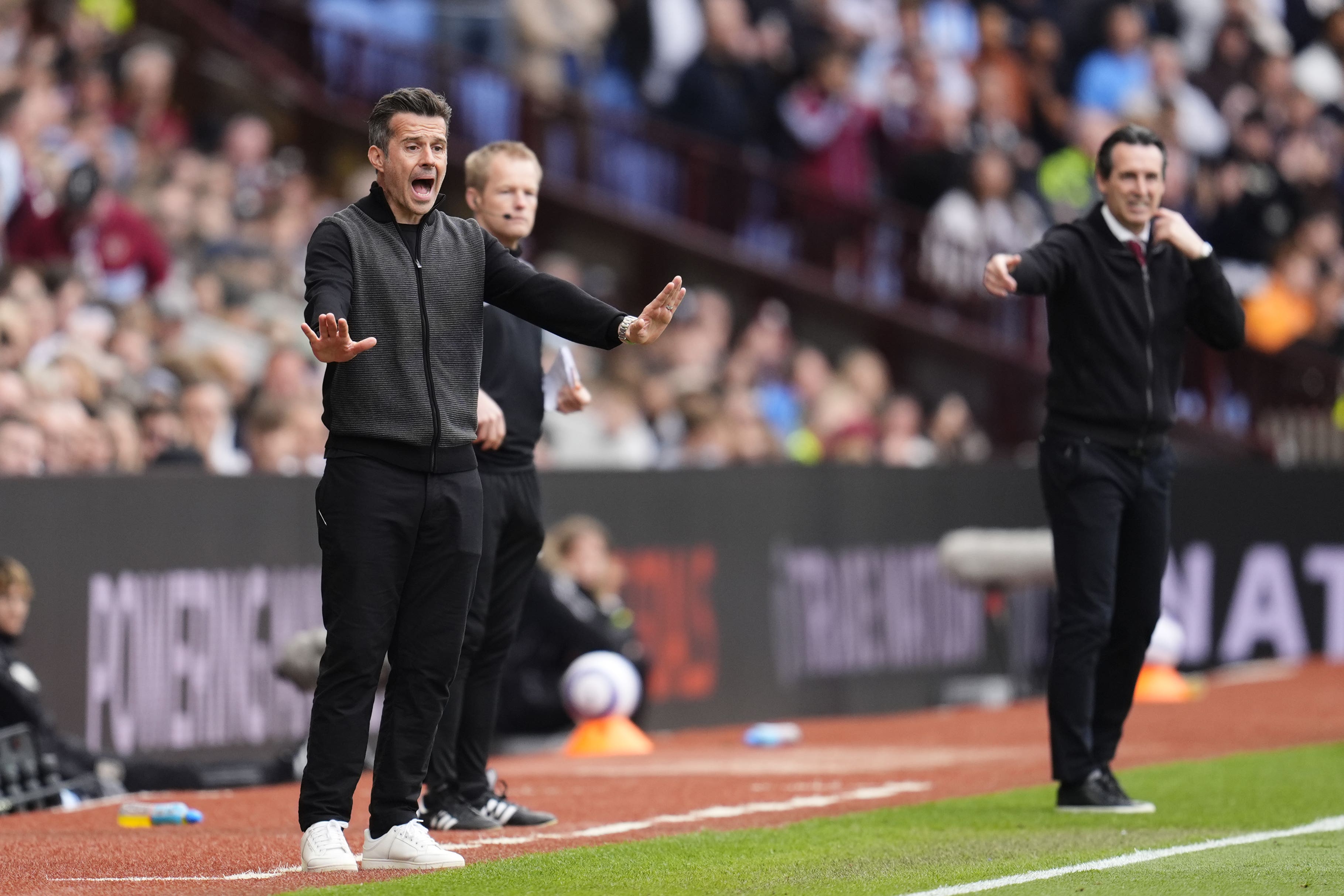 Unai Emery (right) is chasing a European spot (Nick Potts/PA)