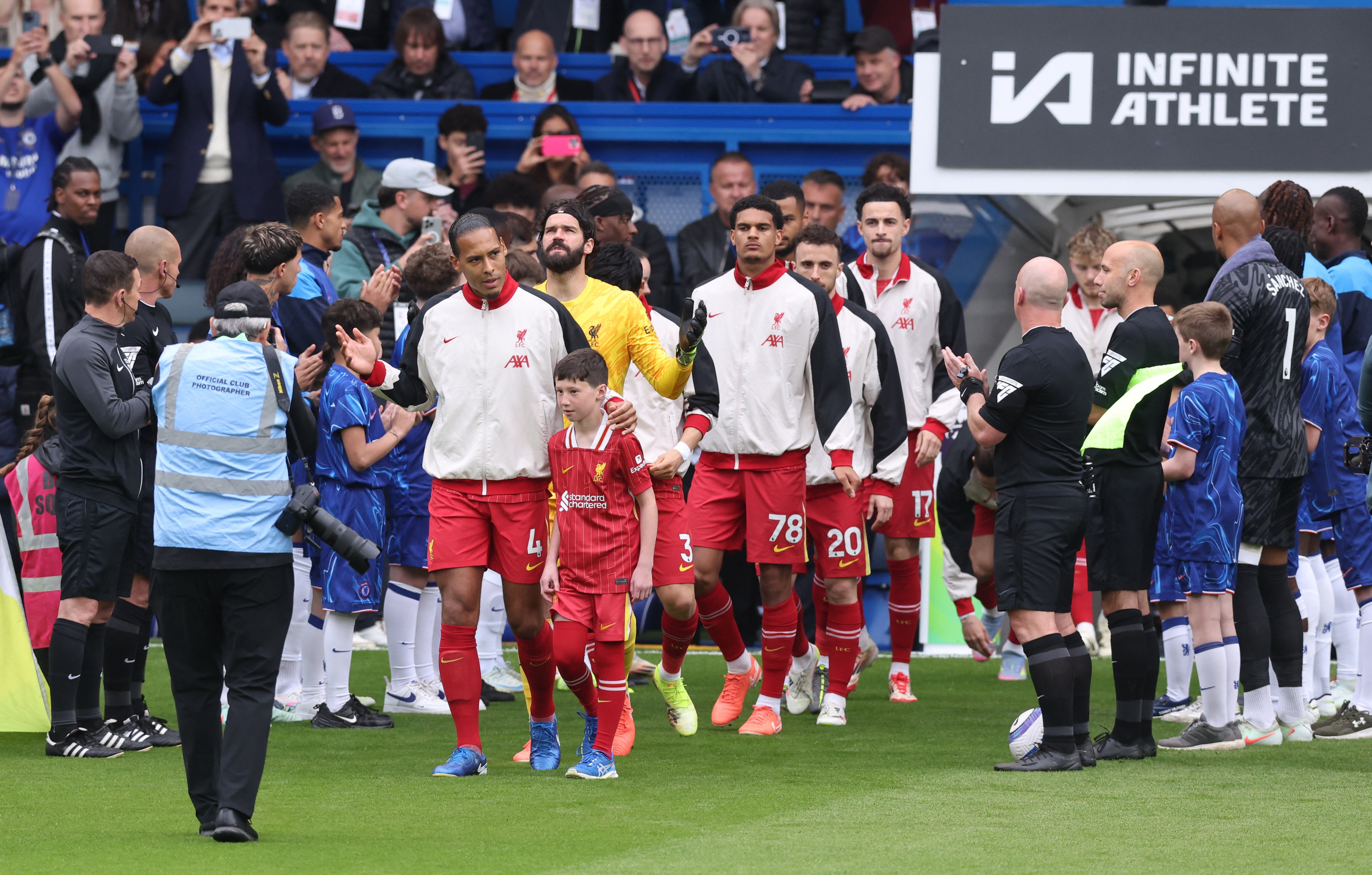 Virgil van Dijk leads champions Liverpool onto the pitch at Stamford Bridge