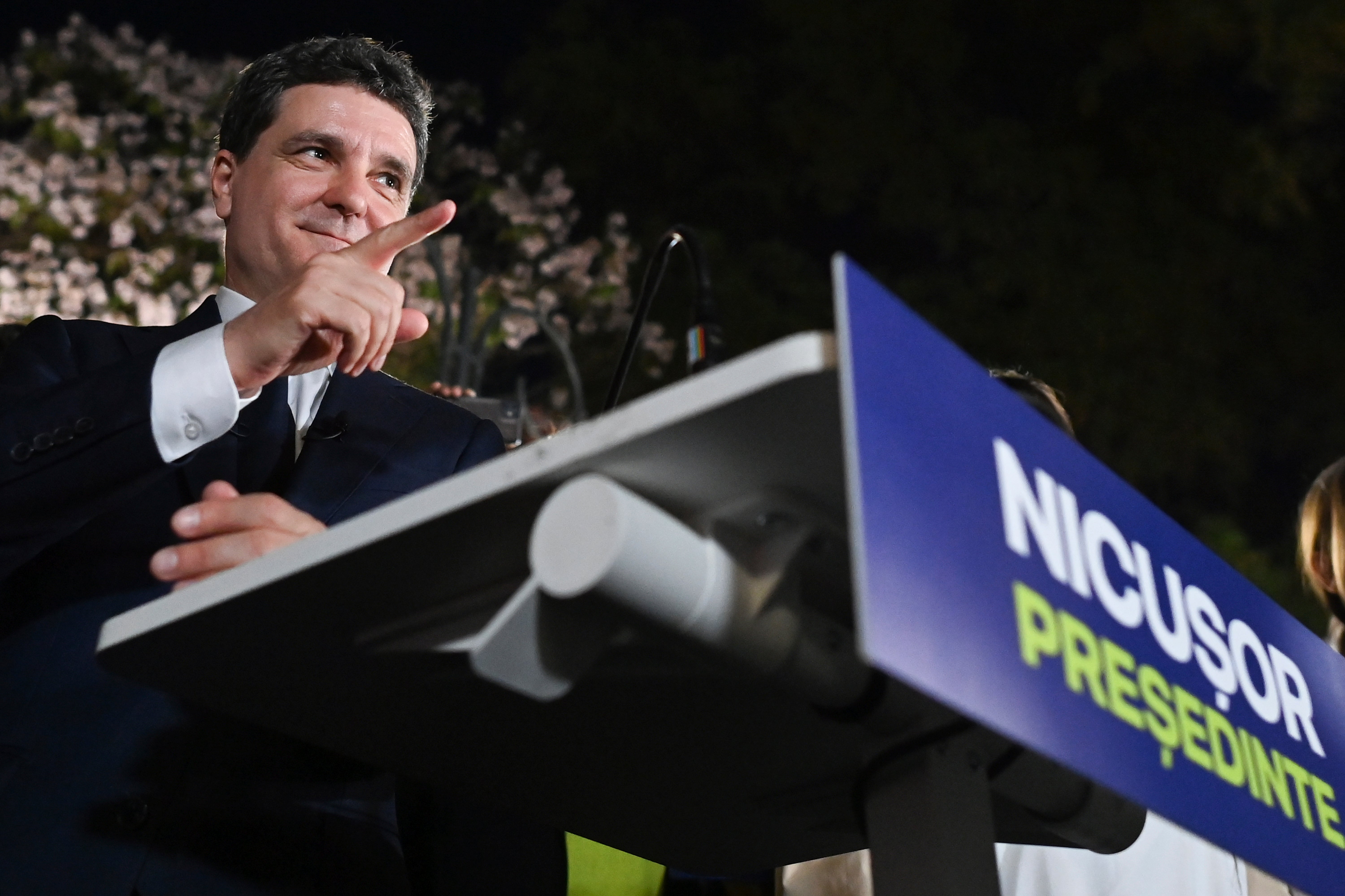 Presidential candidate Nicusor Dan addresses supporters after polls closed for the first round of Romania’s election redo in Bucharest