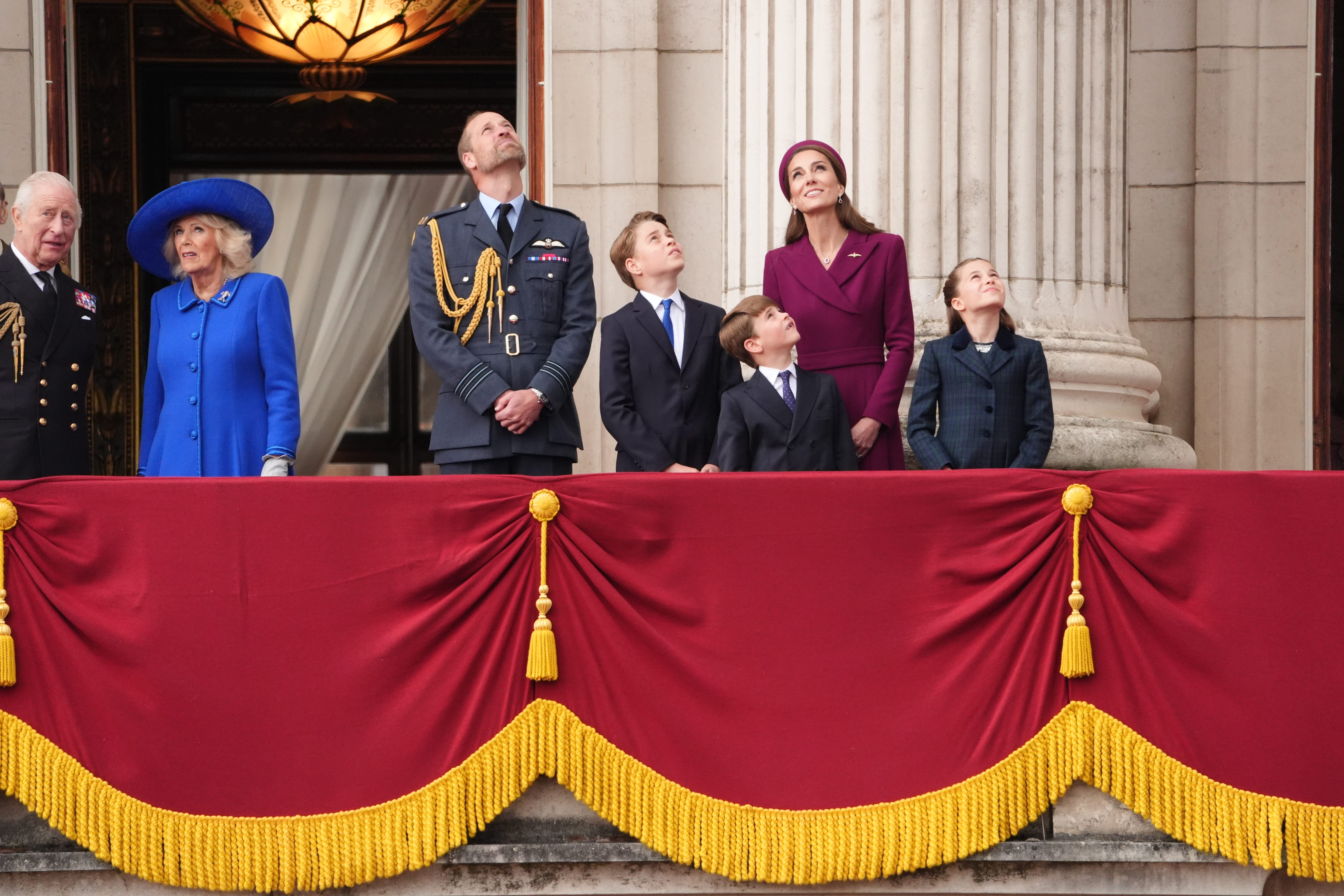 The King, Queen, the Prince of Wales, Prince George, Prince Louis, the Princess of Wales and Princess Charlotte, on the balcony of Buckingham Palace on Monday (Jonathan Brady/PA)