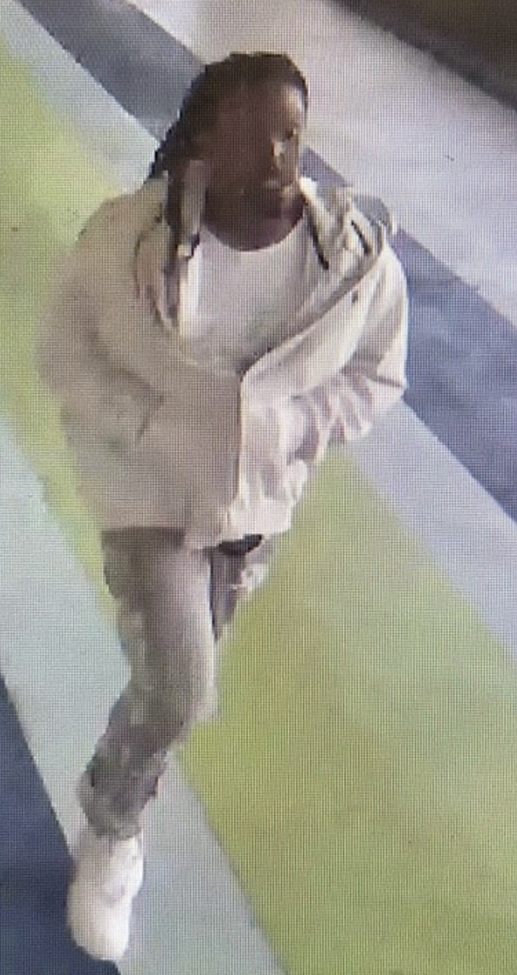 A photo, which was captured on security footage after his escape, shows his hands were tucked into his shirt
