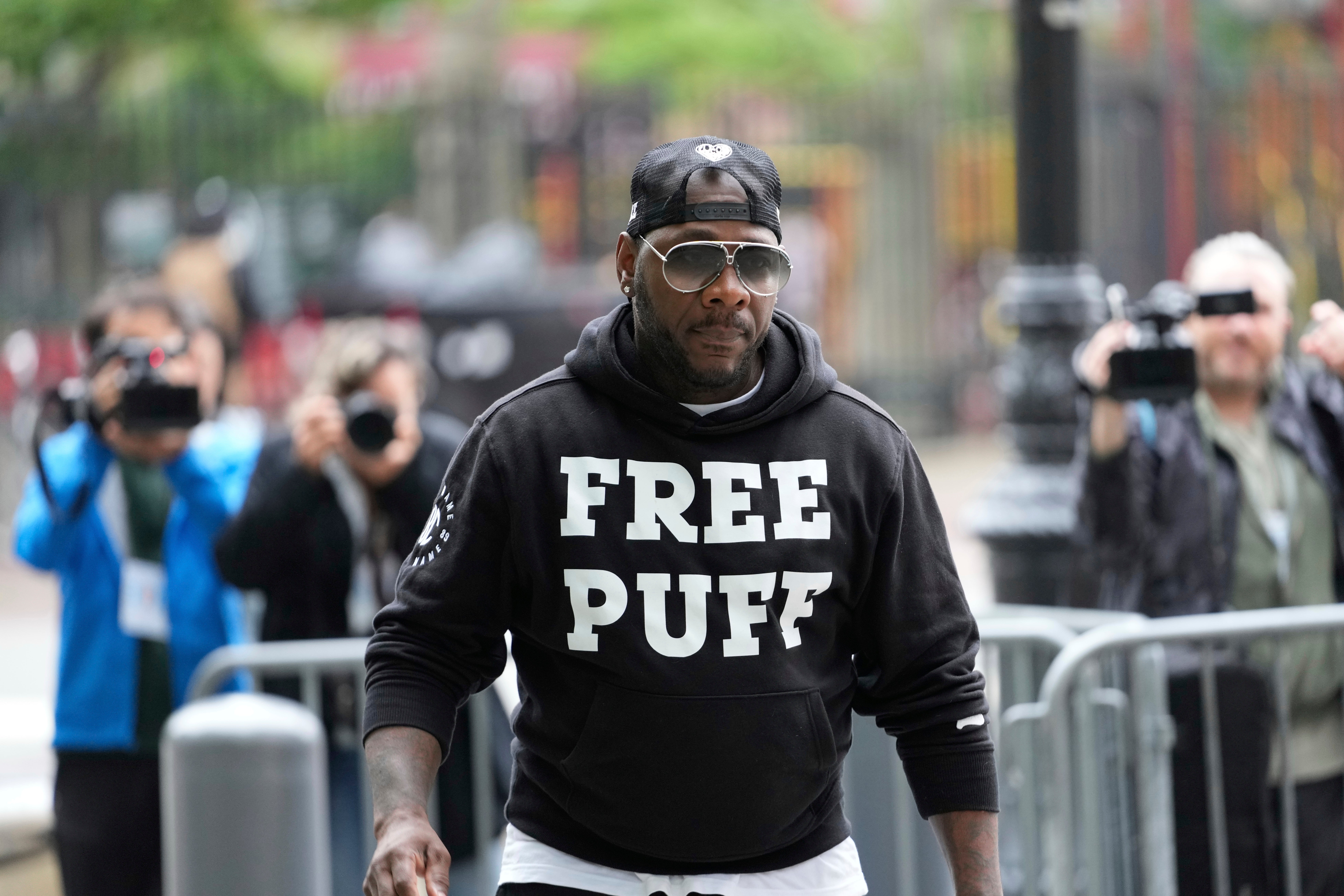 The man wearing a sweatshirt