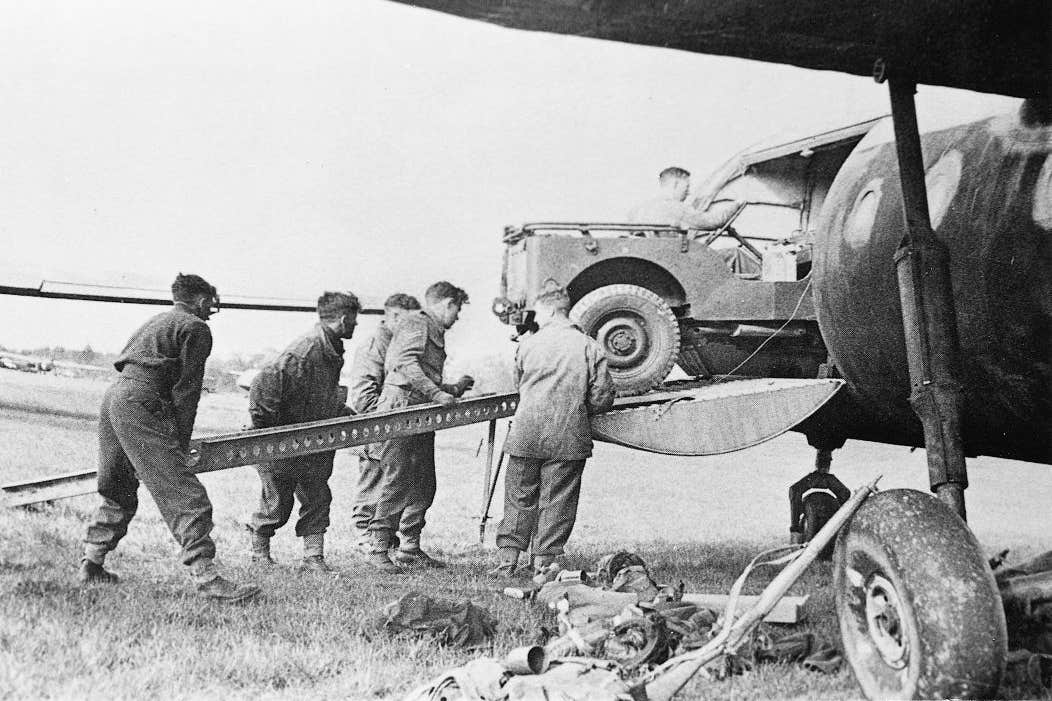 Undated handout photo issued by the Glider Pilot Regiment Society of a vehicle being loaded into a WW2 Horsa glider (Glider Pilot Regiment Society/PA)