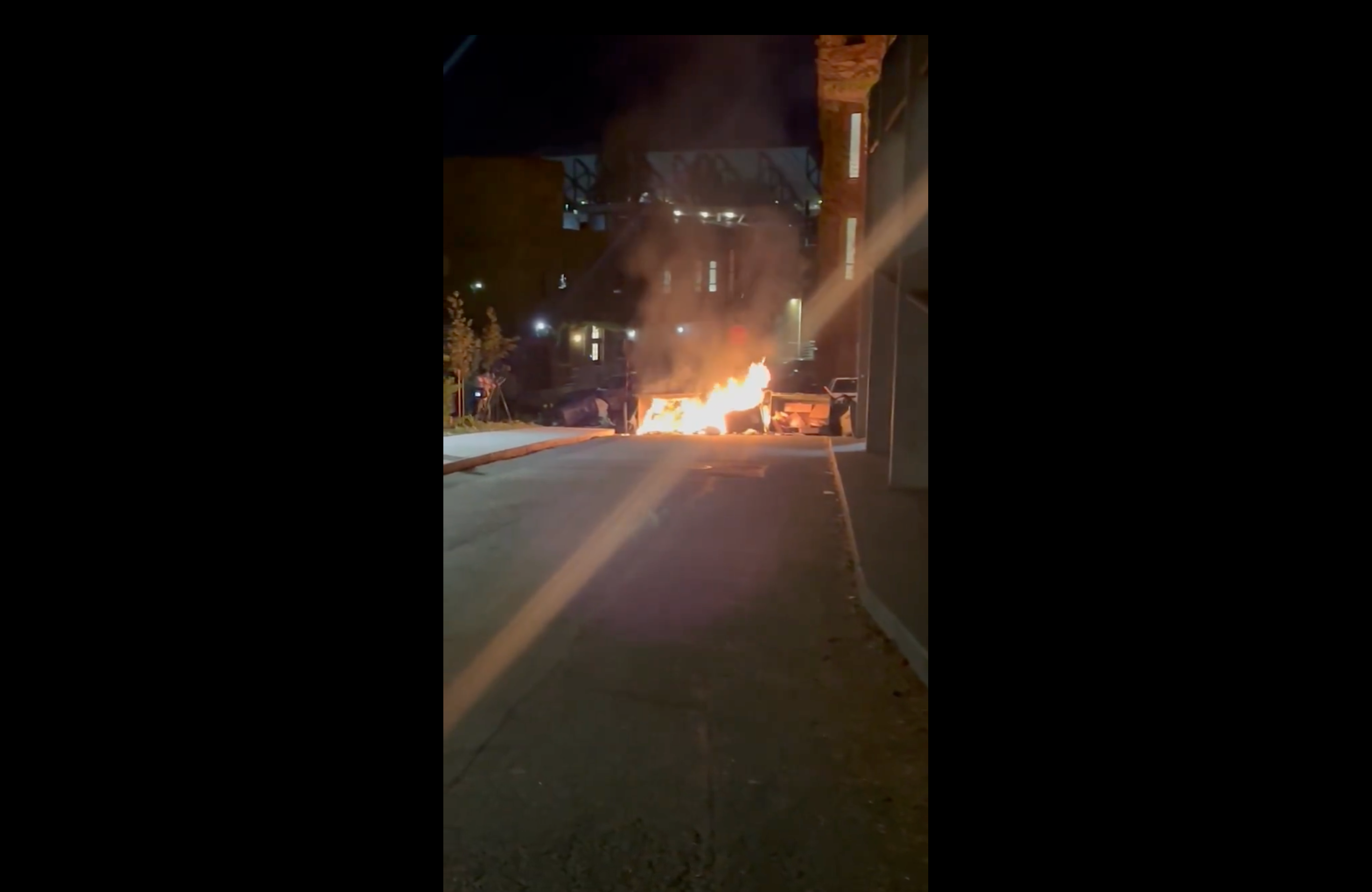 Burning dumpsters used as a blockade during student protest at the University of Washington on Monday May 5 2025