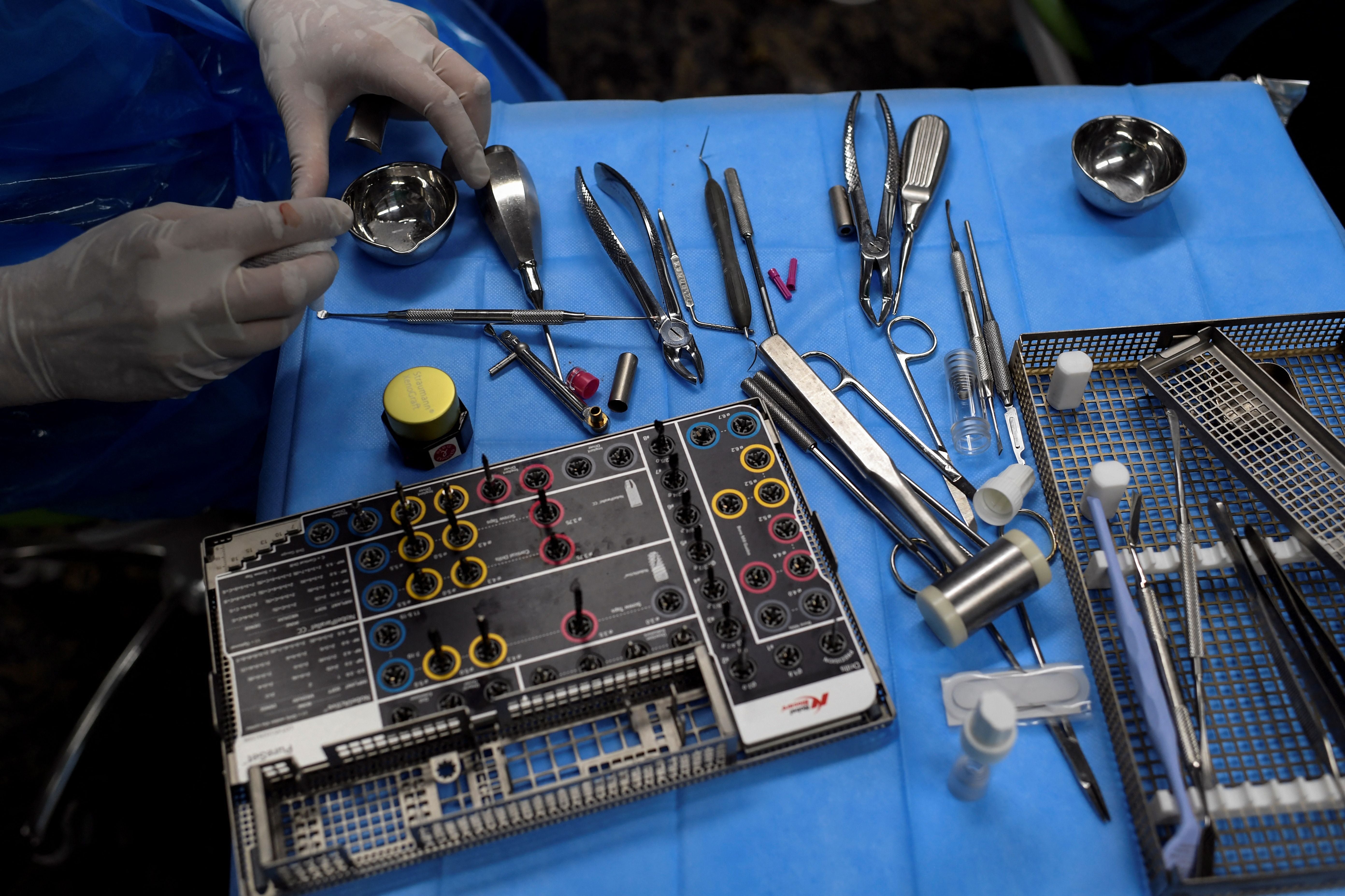 Makke Dakhlaoui claims he could not object to what was happening since his mouth was full of sharp tools at the time