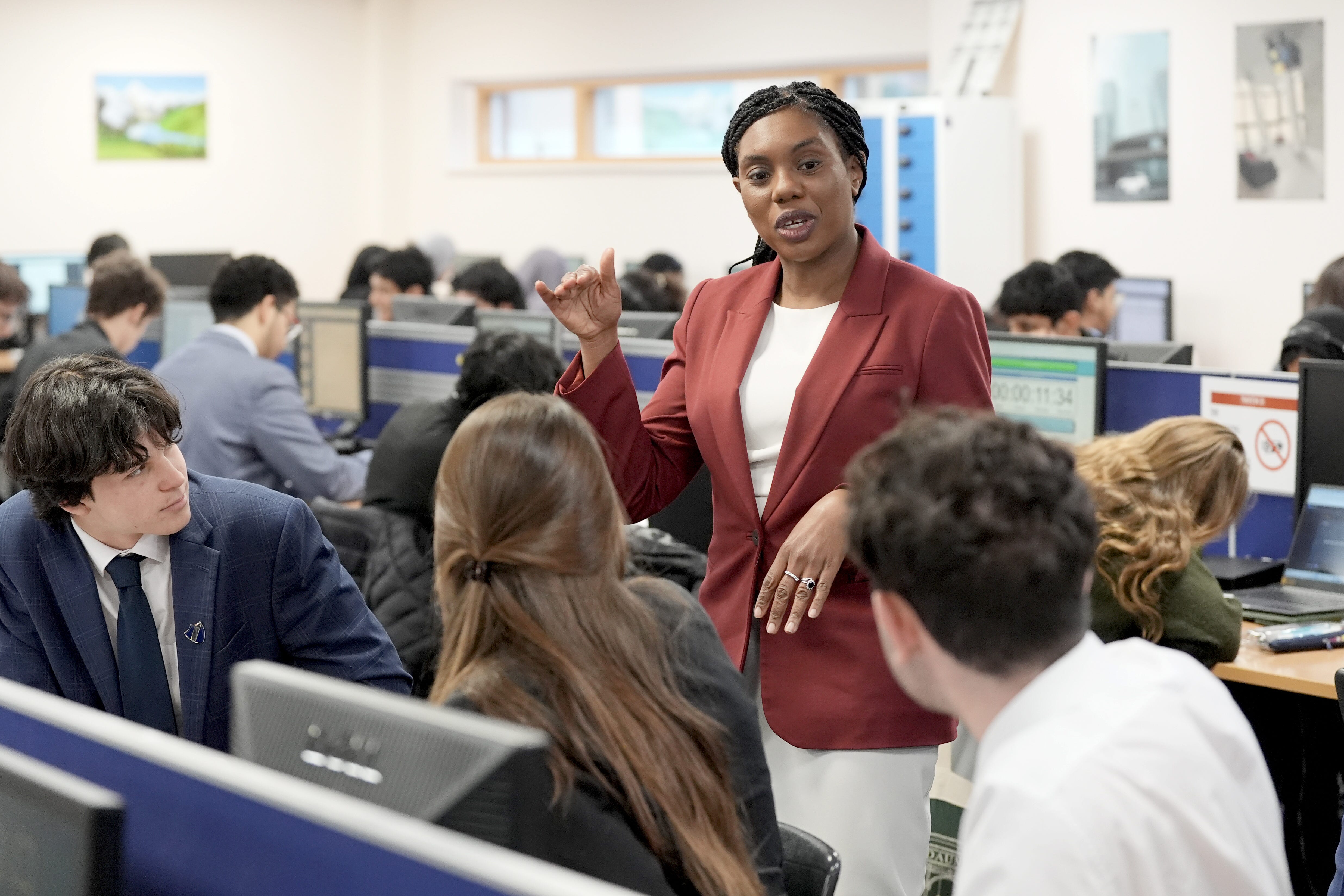 Kemi Badenoch said she was ‘confident’ she would lead the Tories into the next general election during a visit to a school on Tuesday (Stefan Rousseau/PA)