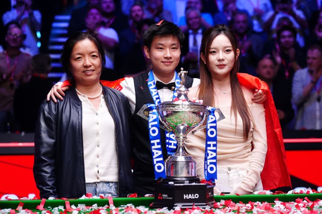Zhao Xintong has been warned to resist a spending spree by his manager Victoria Shi (left) (Mike Egerton/PA)