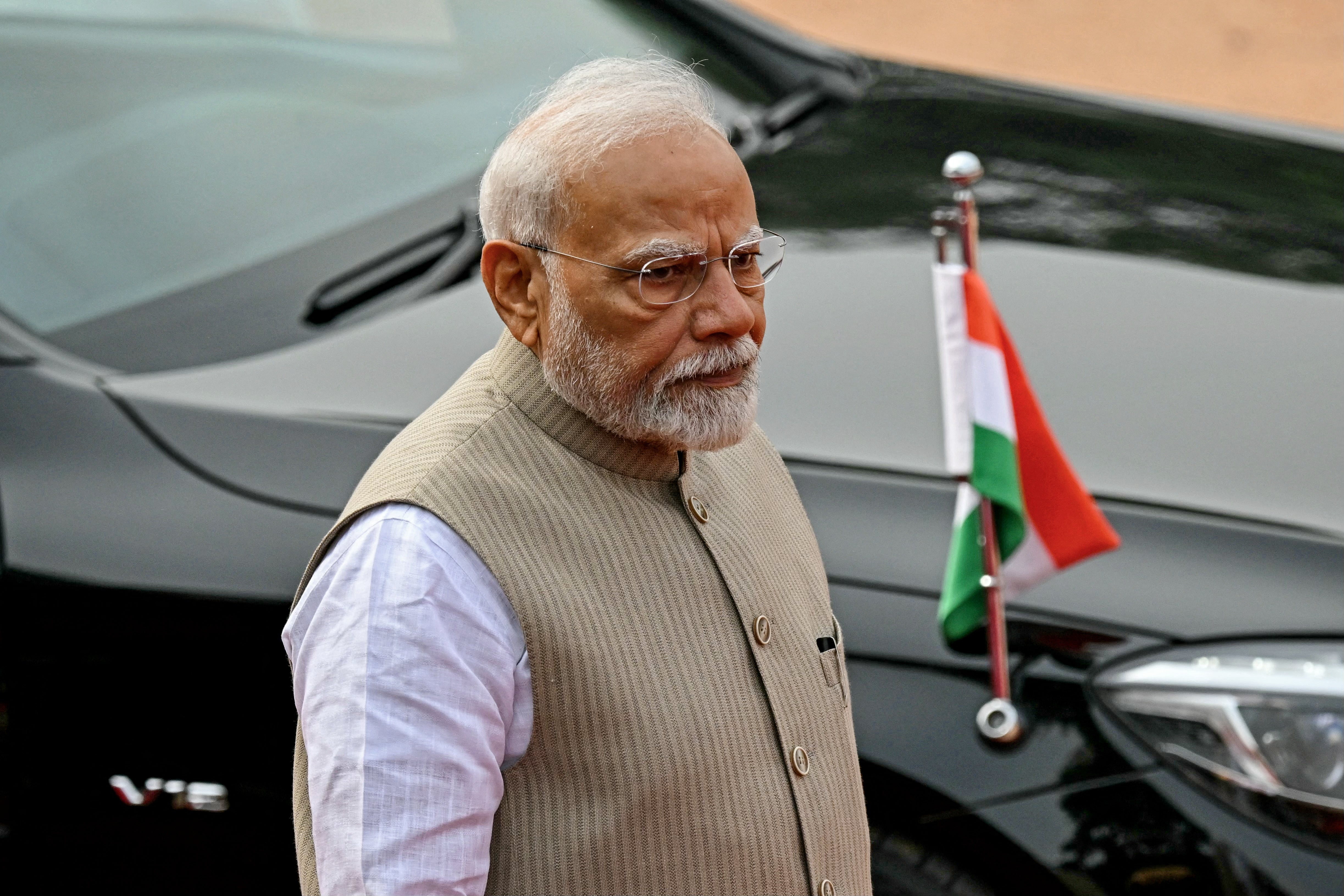 India's prime minister Narendra Modi looks on during the ceremonial reception of Angola's president Joao Lourenco in New Delhi on 3 May 2025