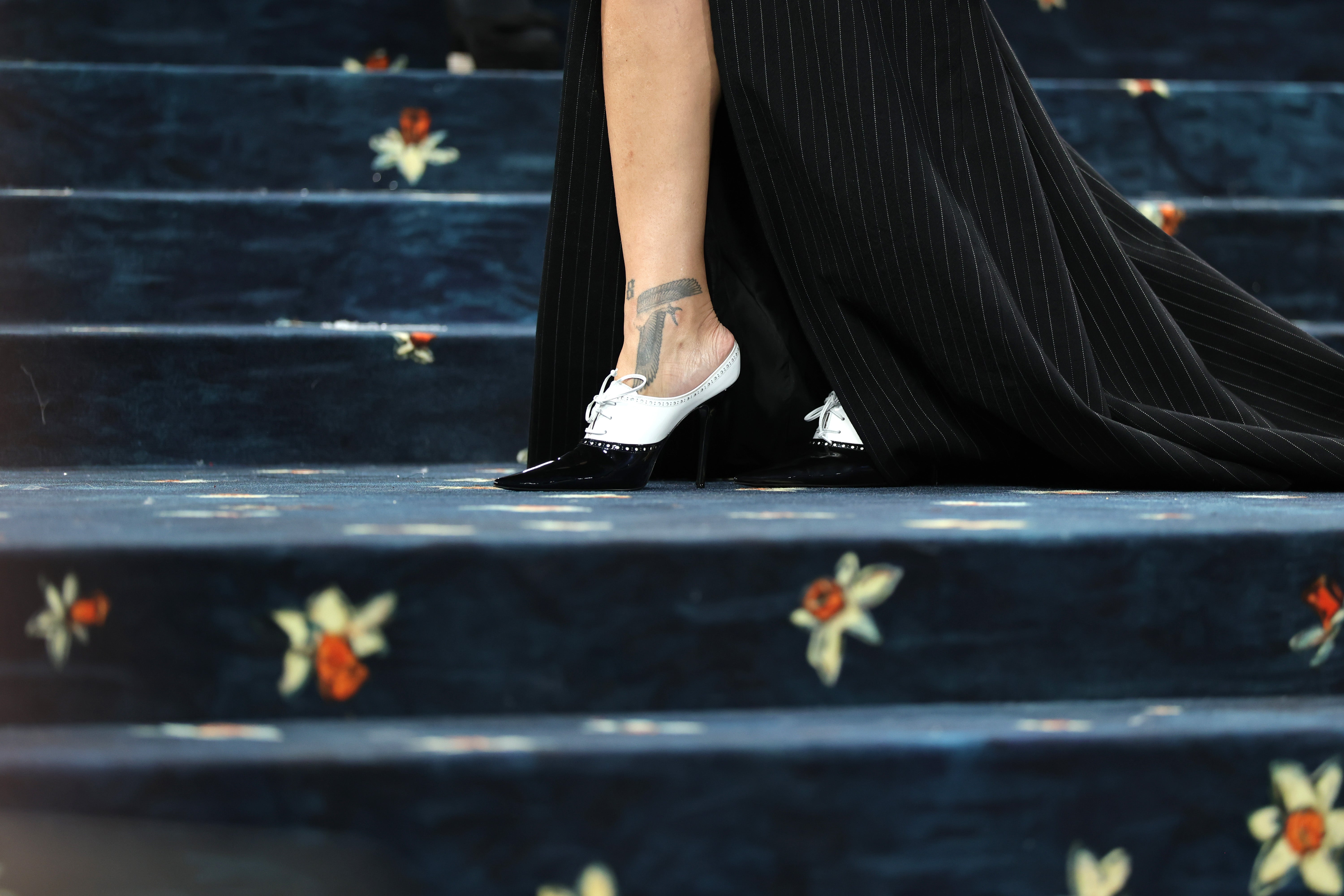 Rihanna was sporting black and white vintage-looking shoes