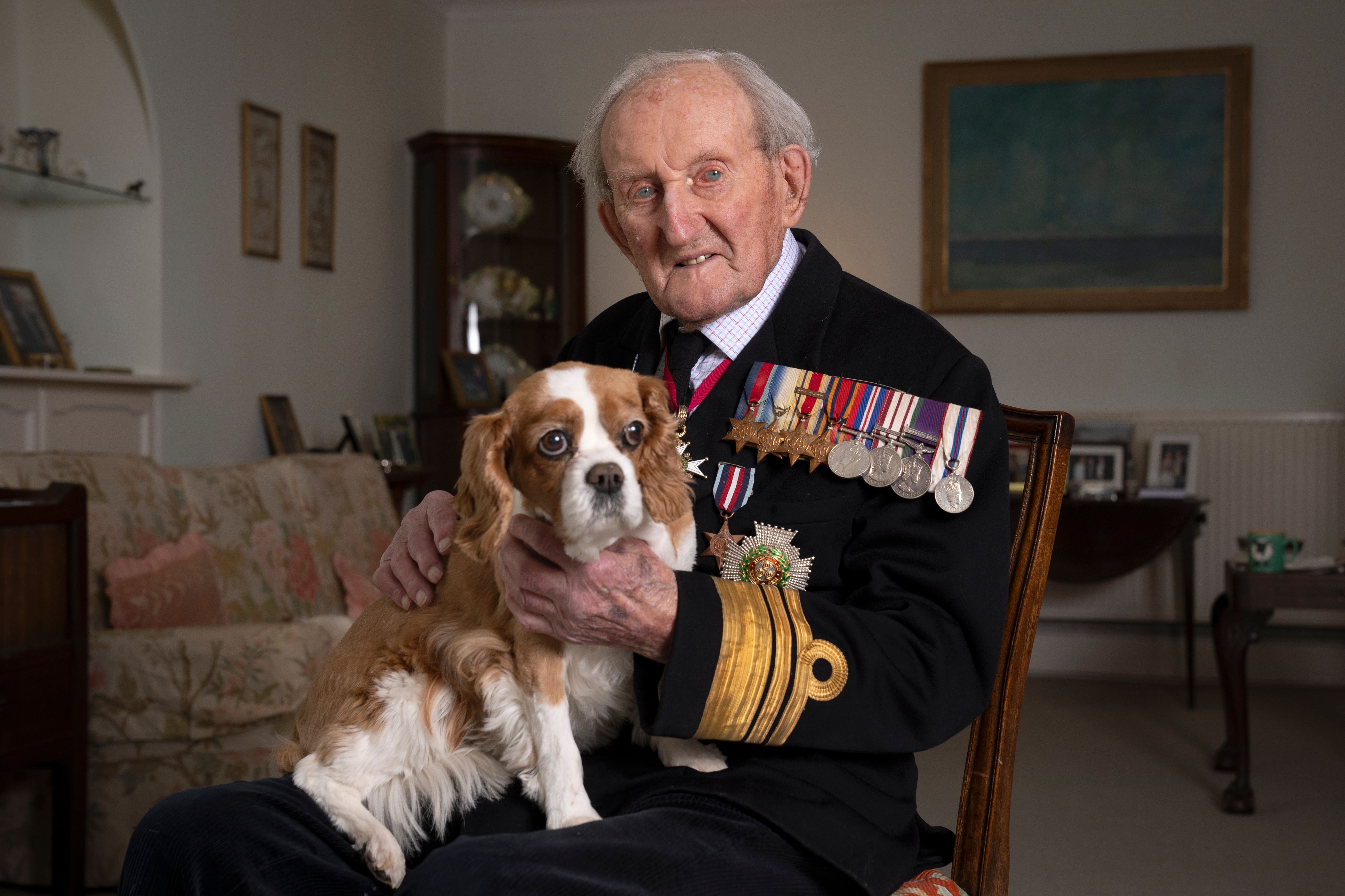 Vice Admiral Sir Tom Baird with his dog Victoria (Jane Barlow/PA)