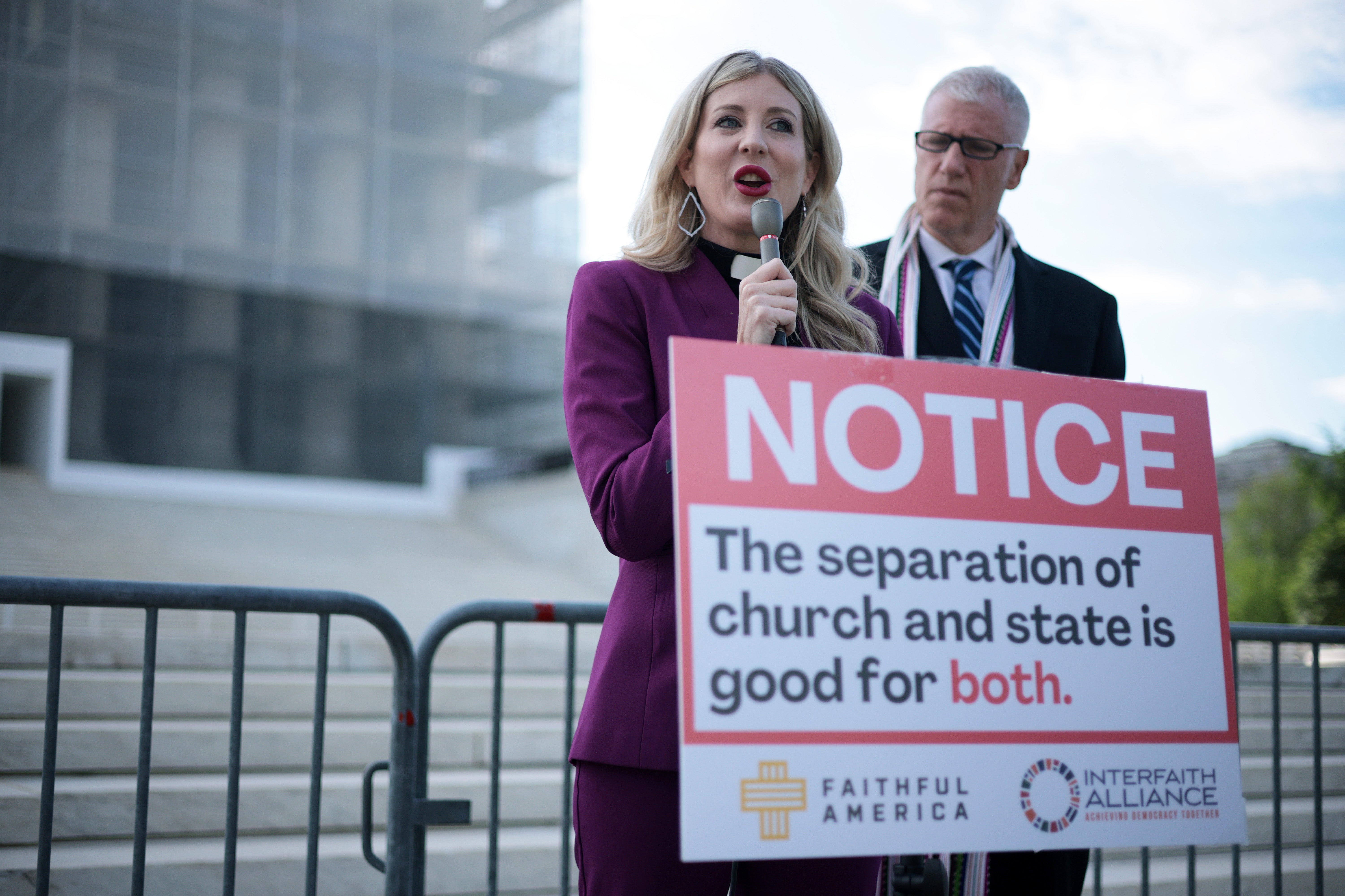 Rev. Dr. Shannon Fleck, pictured speaking outside the Supreme Court in Washington, D.C., has warned against right-wing figures like Walters ‘warping’ Christianity to advance a certain political ideology