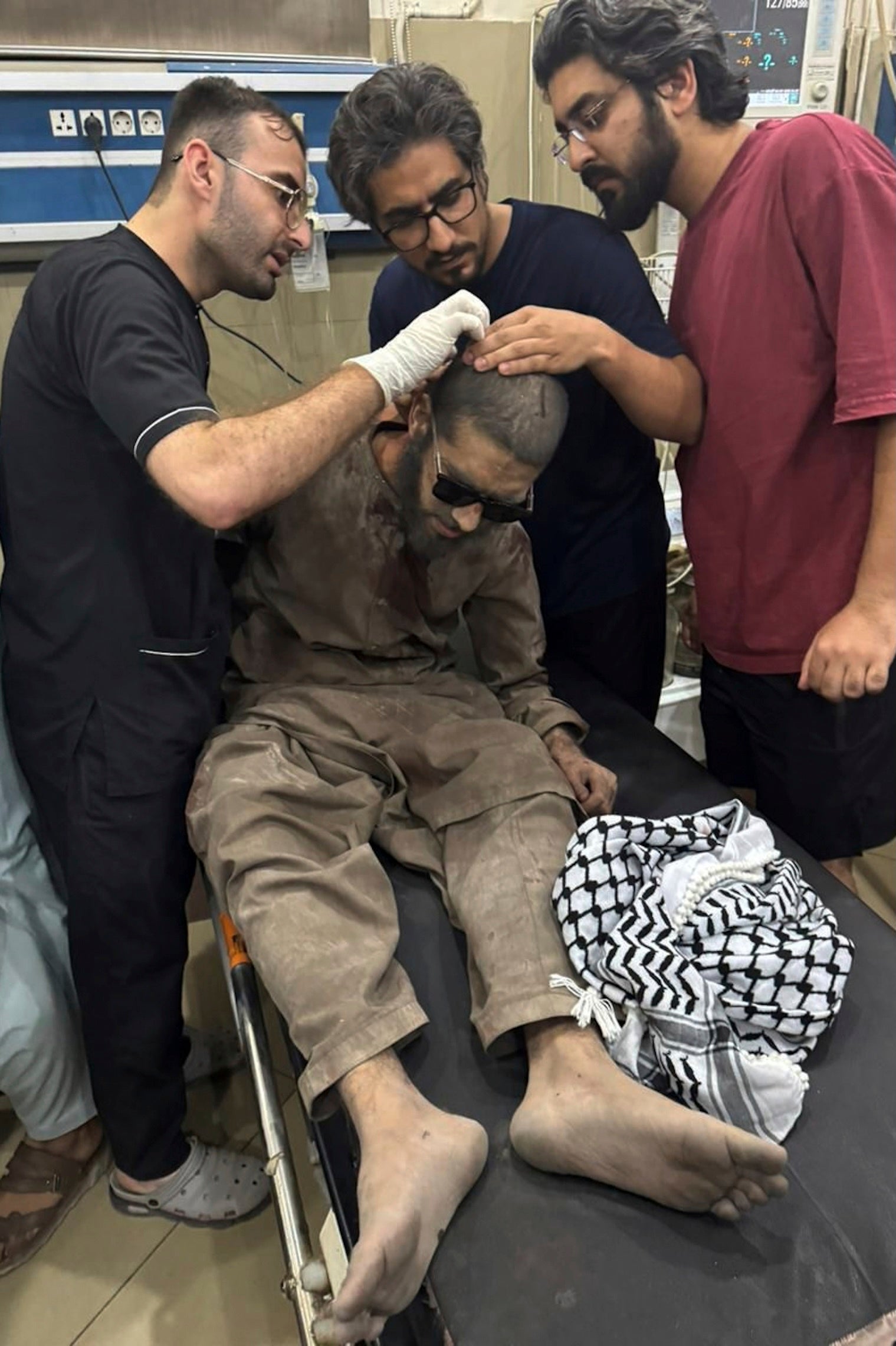 In this photo released by the Inter Services Public Relations, a person injured in the Indian missile attack receives treatment at a hospital in Bahawalpur, Pakistan, on 7 May 2025