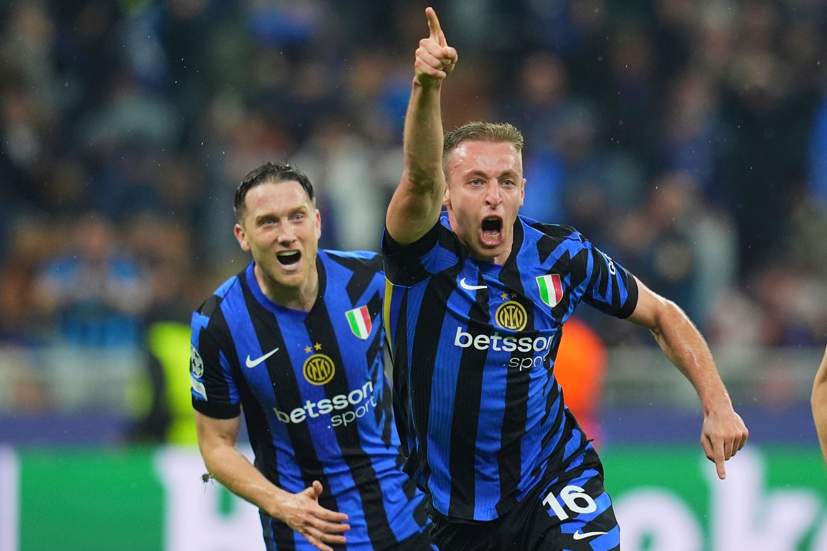 Davide Frattesi (centre) celebrates after scoring Inter Milan’s Champions League semi-final winner against Barcelona (Spada/LaPresse via AP)